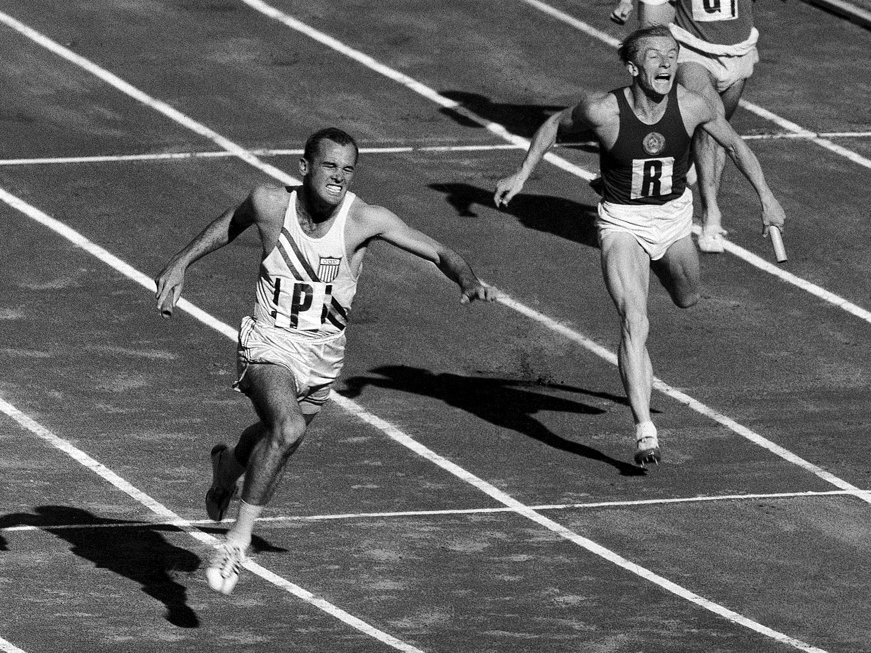 Bobby Joe Morrow (left) hits the finish line to give the US the gold in the 4 x 100 meter relay at the Melbourne Olympics in 1956.