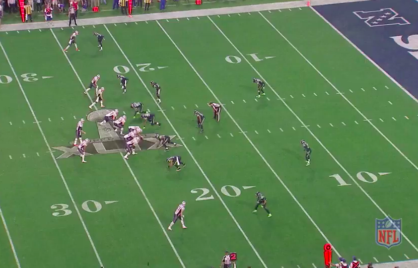 On a key play in Super Bowl XLIX, tight end Rob Gronkowski (bottom) is lined up alone on one side, opposite Seahawks linebacker K.J. Wright, while three Patriots receivers — and cornerback Richard Sherman — are on the other. Gronkowski caught a 22-yard touchdown pass on the play.