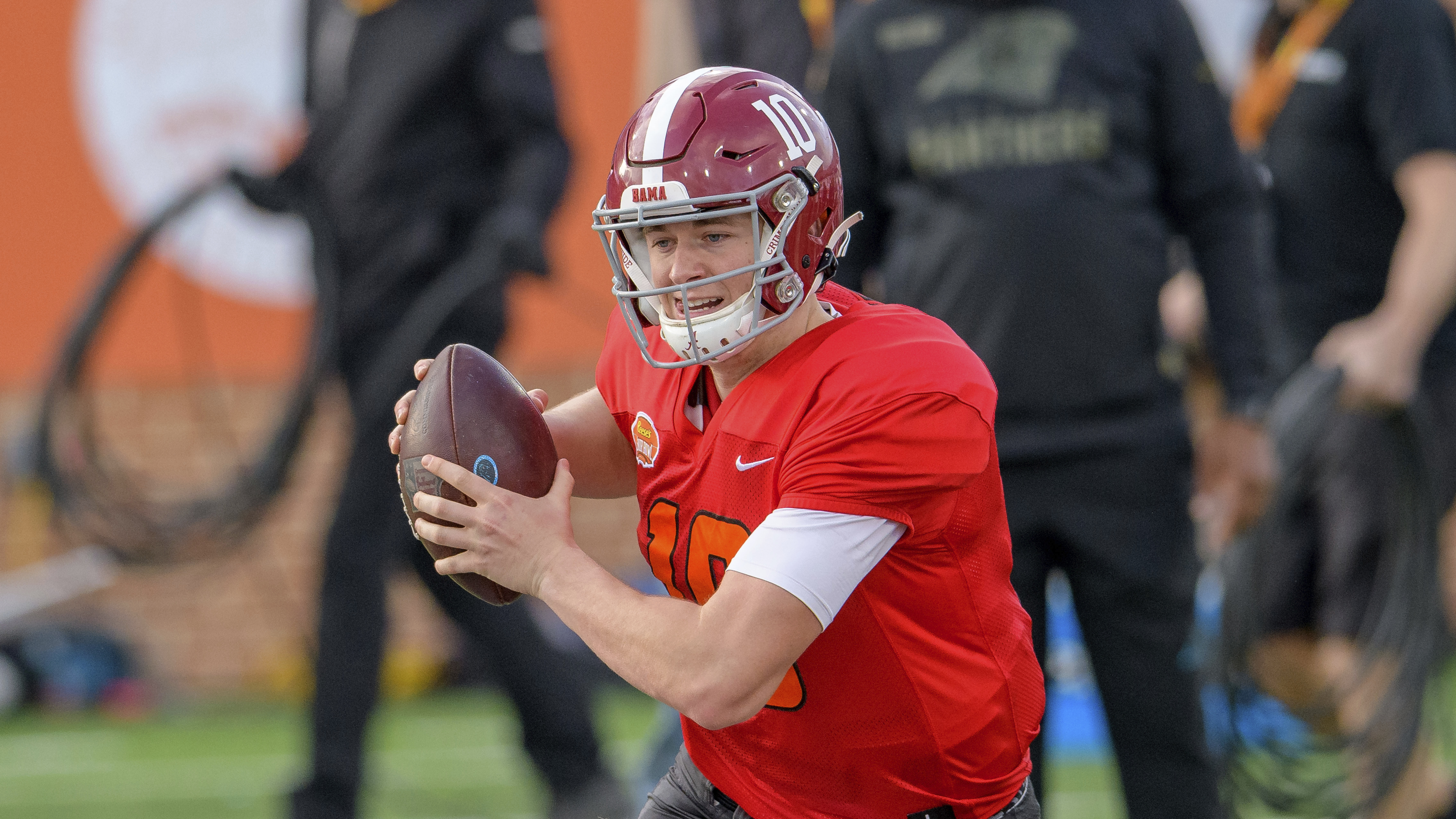 Mac Jones of Alabama looks for some room to run during Wednesday's practice.