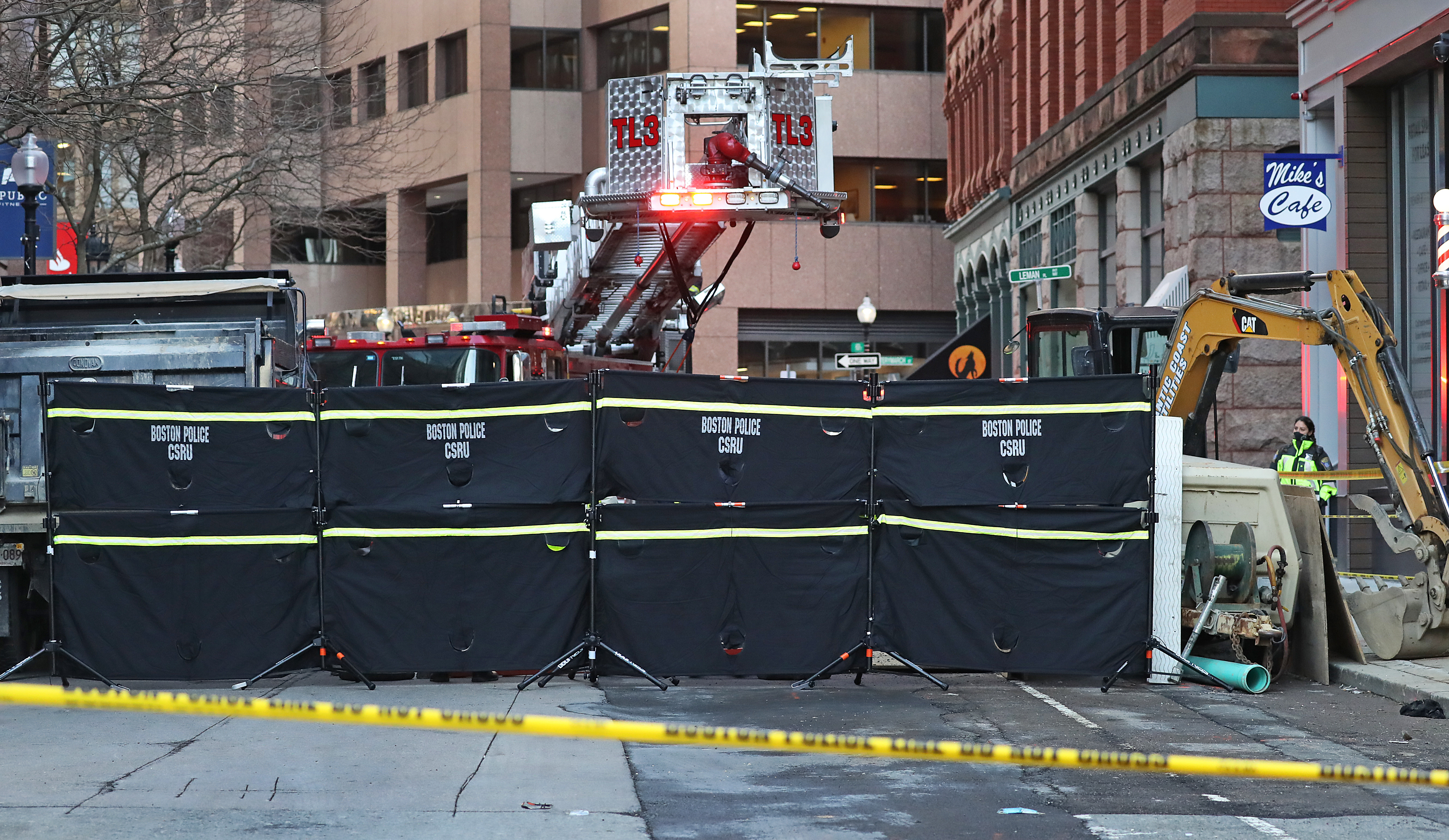 A black curtain was set up as bodies were removed from the accident scene.