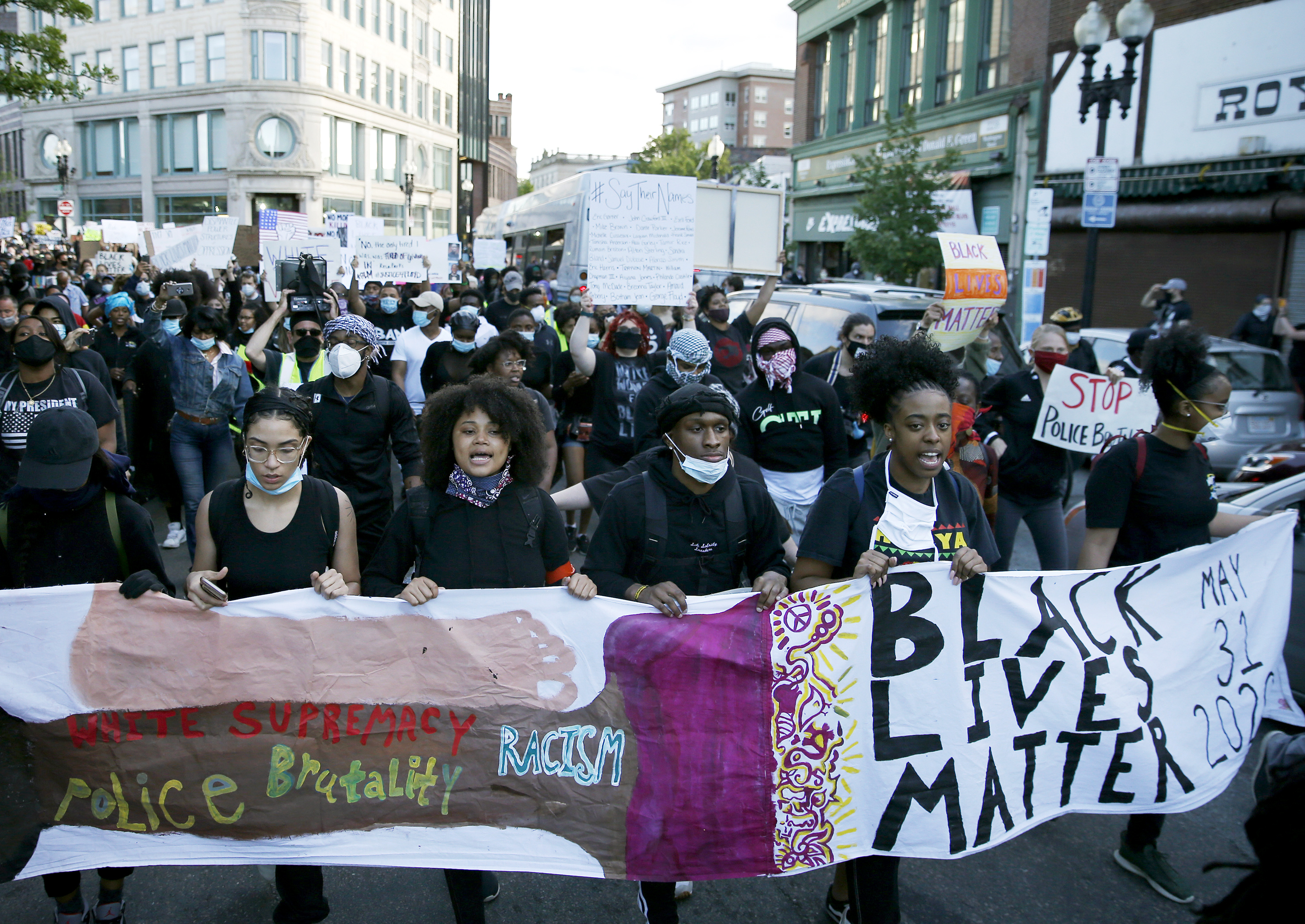Organizers Toiell Washington (second from left) and Amel Viaud (fourth from left) marched with Boston protesters in May to protest the police killing of George Floyd in Minneapolis.