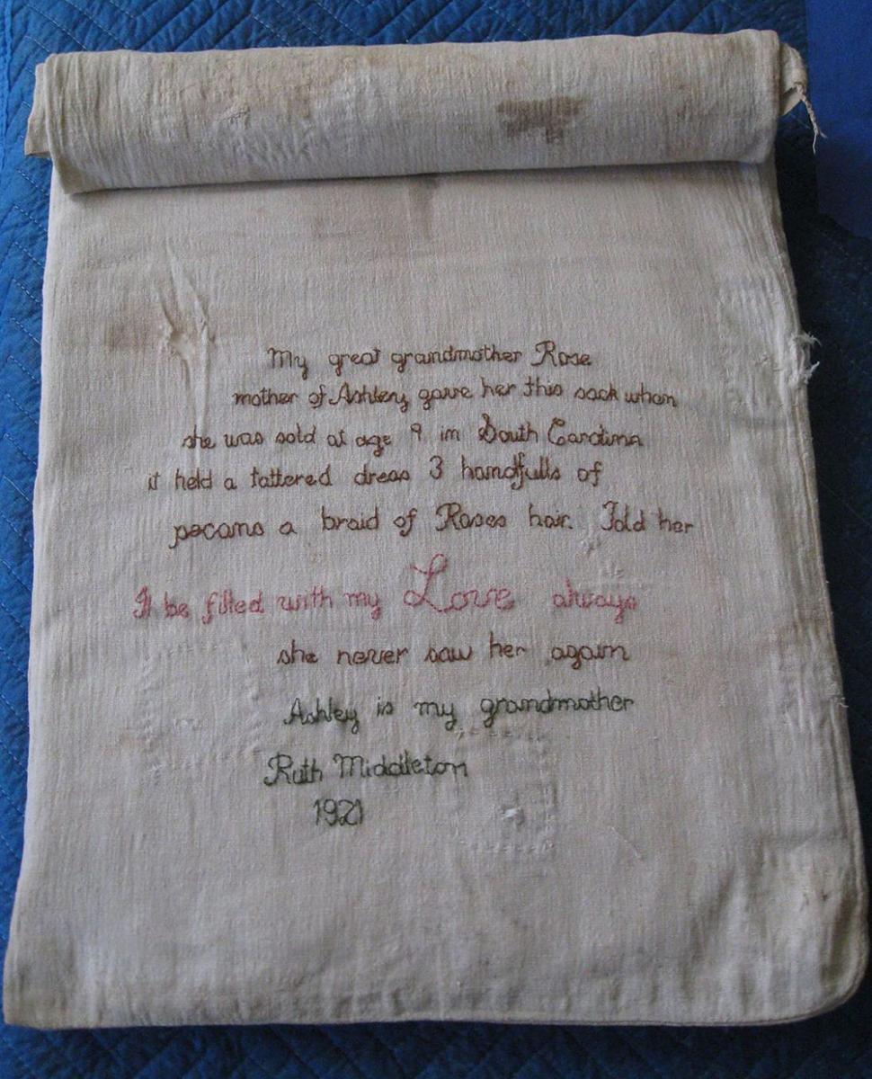 The sack that an enslaved woman named Rose gave to her daughter Ashley. A descendant later embroidered it with its story.