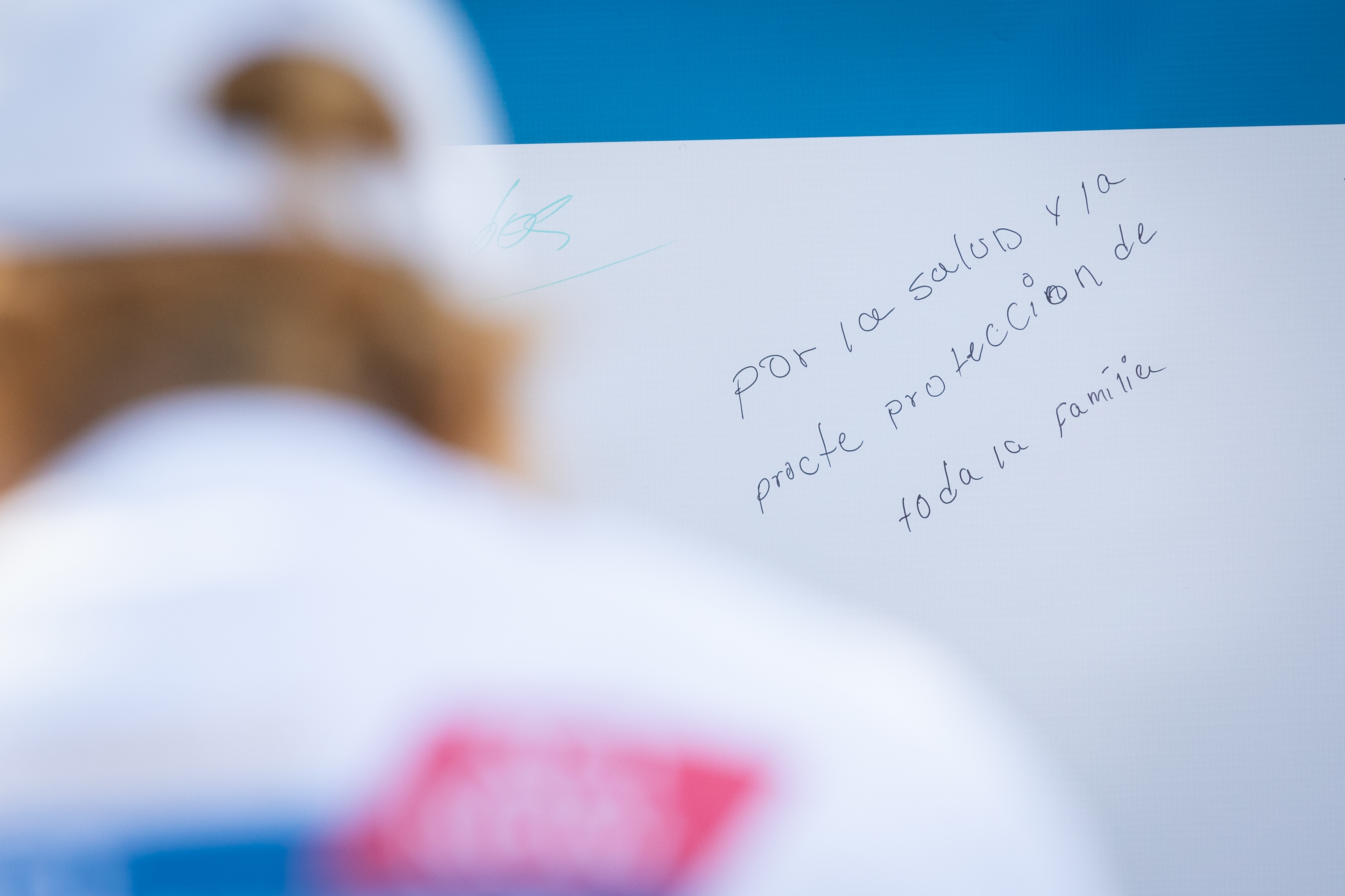 Vaccine recipients left thank you messages on a banner at the mobile vaccine site Saturday.