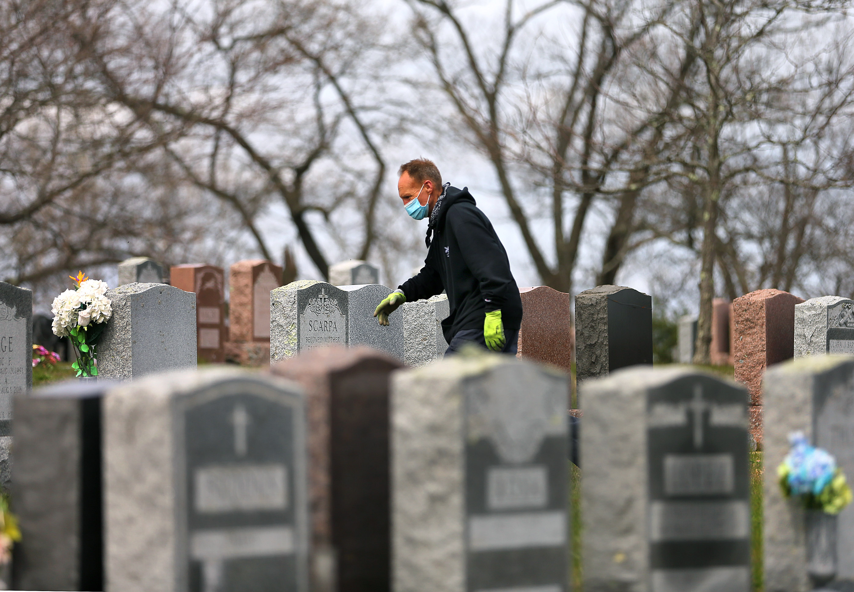 A gravedigger's to-do list: 'Burial. Burial. Burial.' - The Boston Globe