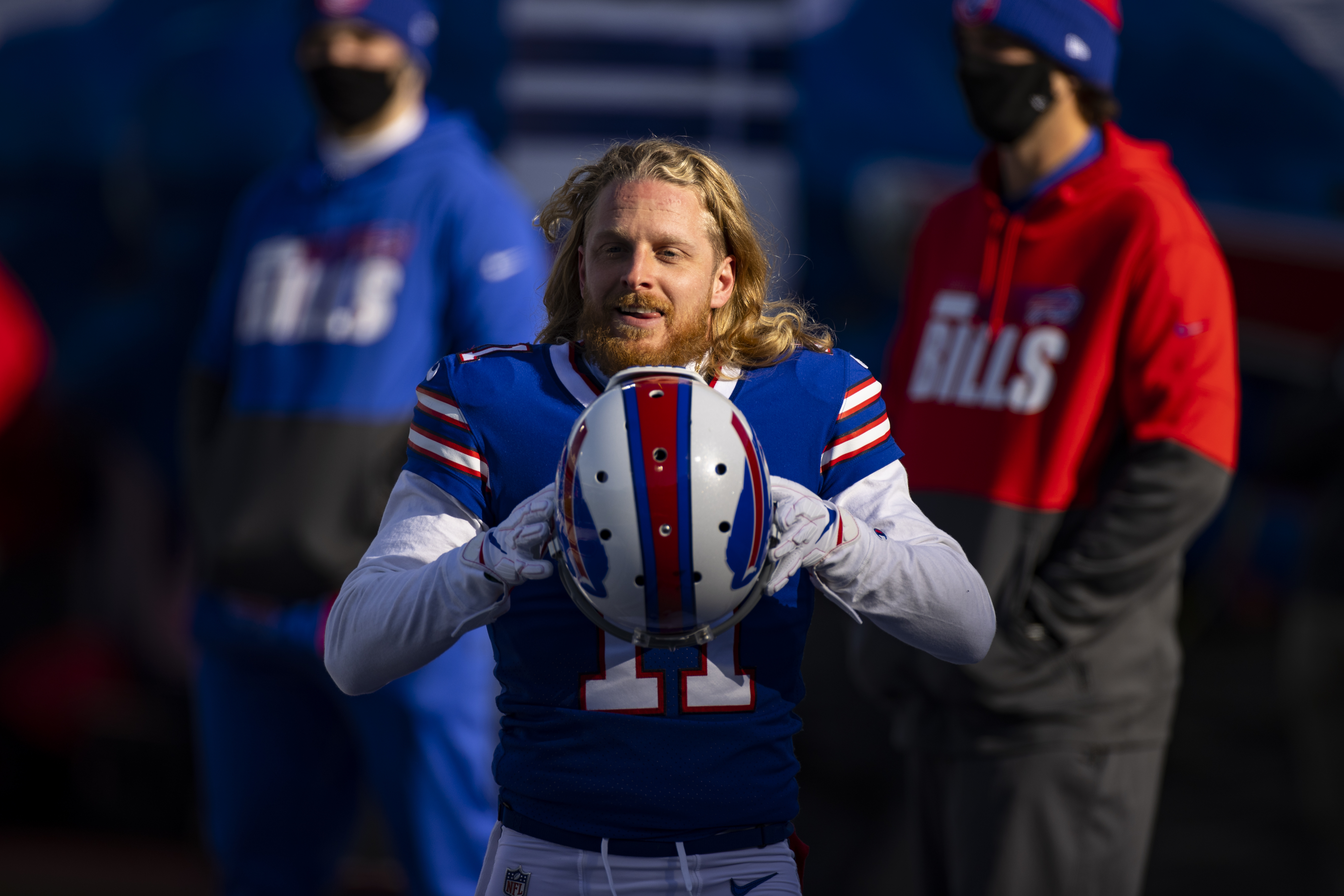 Cole Beasley puts his helmet on as he warms up before Buffalo's playoff game against the Indianapolis Colts on Jan. 9, 2021.