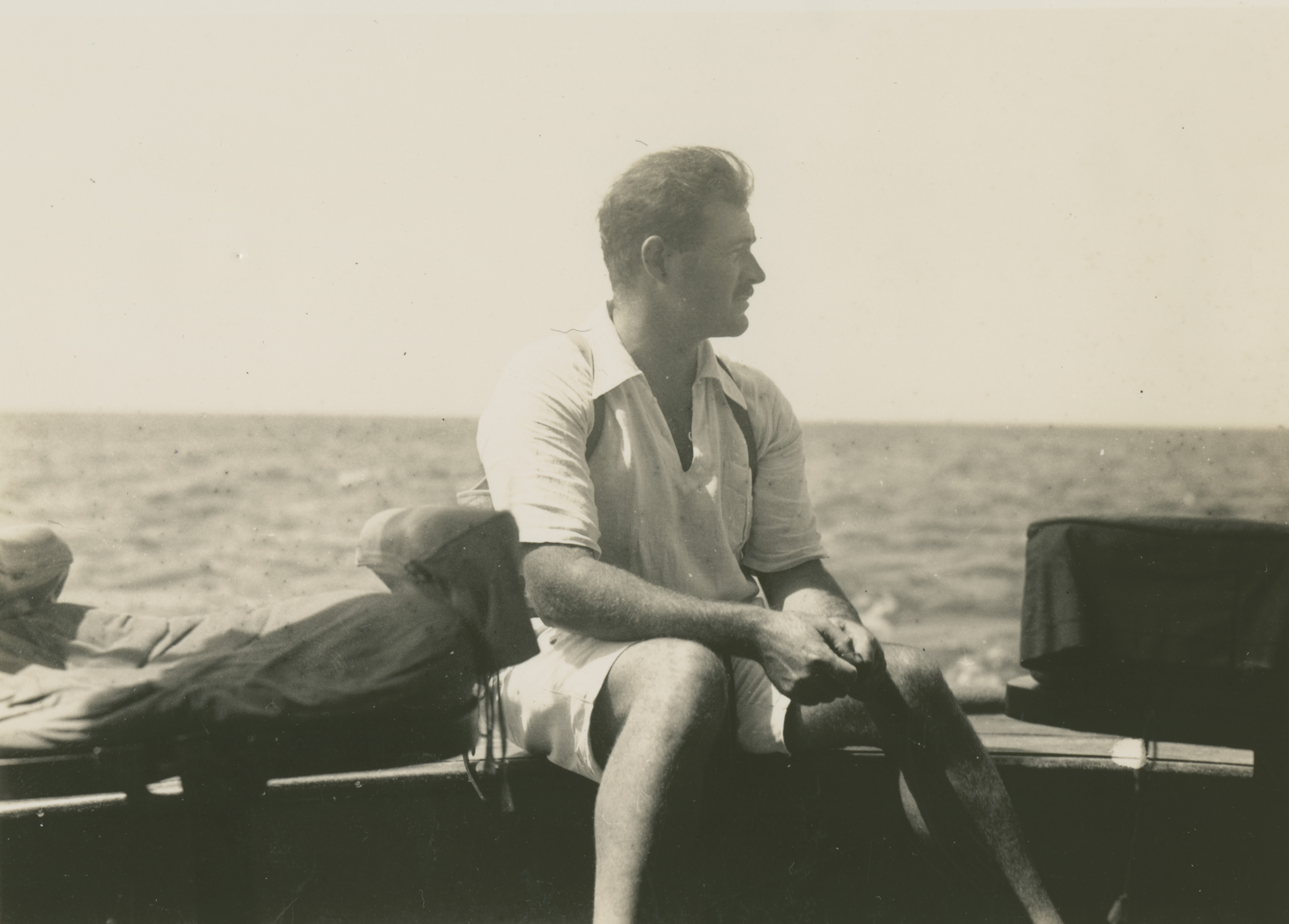 Ernest Hemingway on a fishing boat, circa 1929.