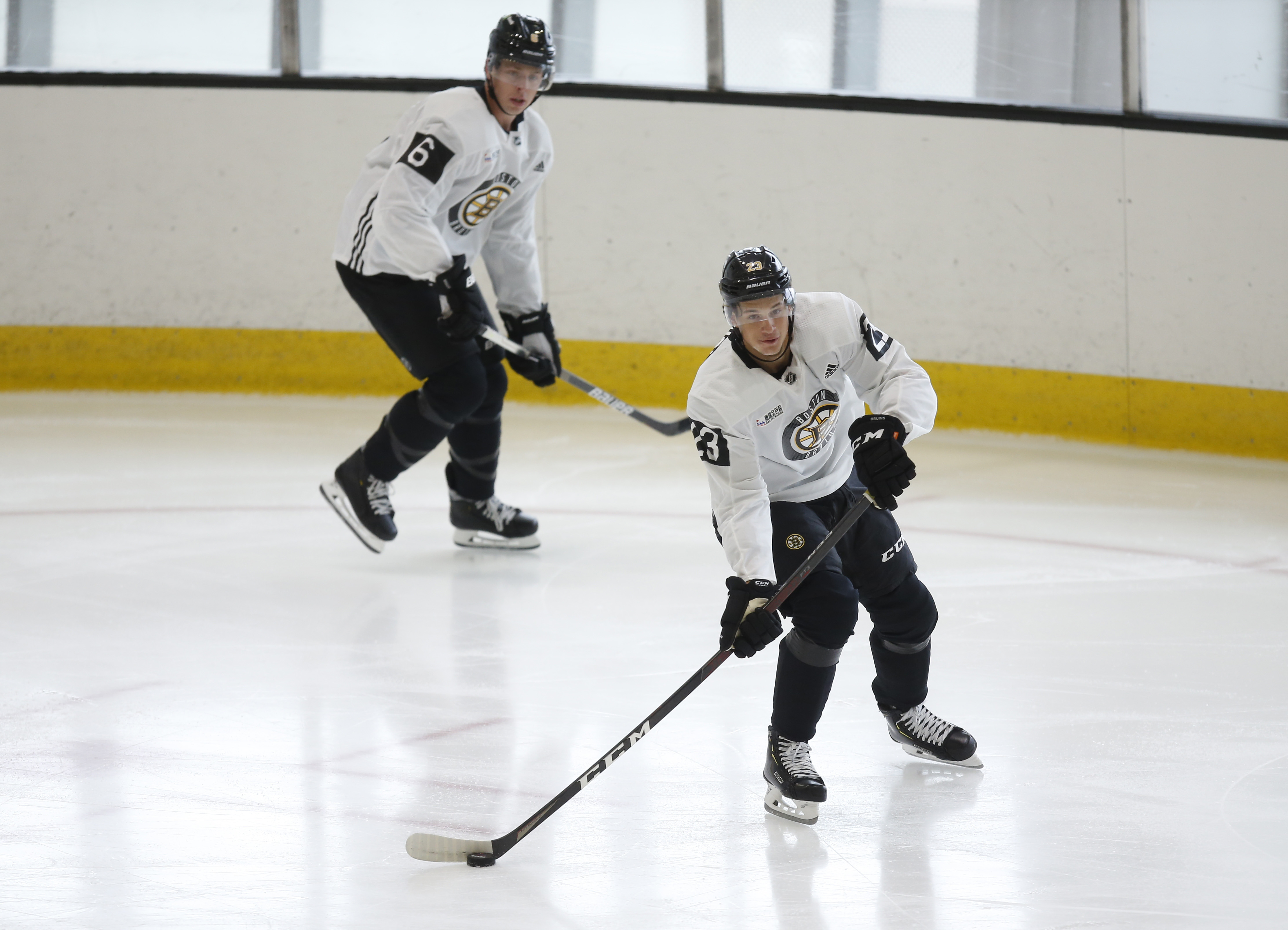 Mike Reilly (top) and Jack Studnicka on the ice at Warrior Arena Thursday.