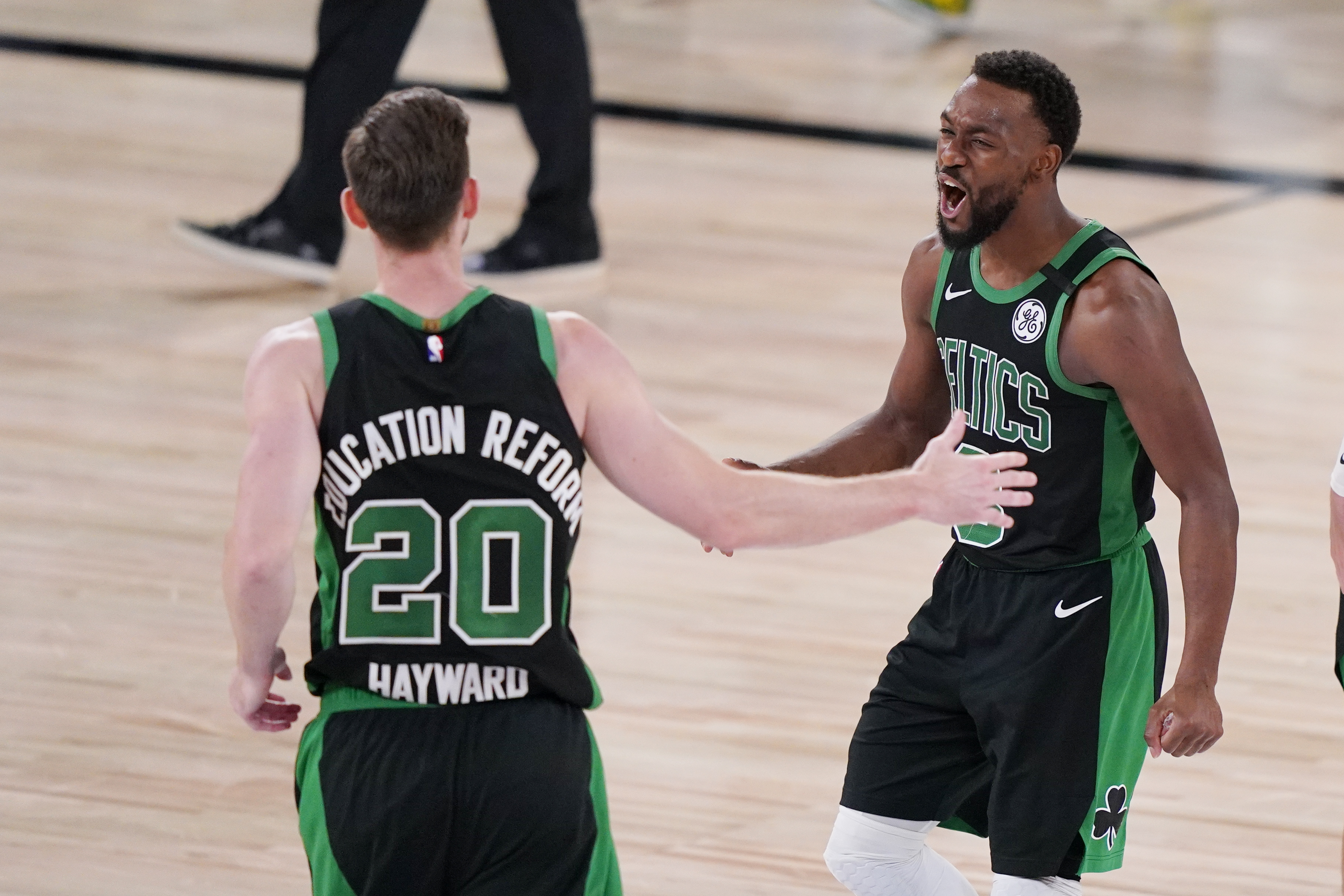 Kemba Walker (right) was a plus-20 in a series-low 28 minutes on Friday night, just his second positive game of the five against Miami and double his plus-10 from Boston's Game 3 win.