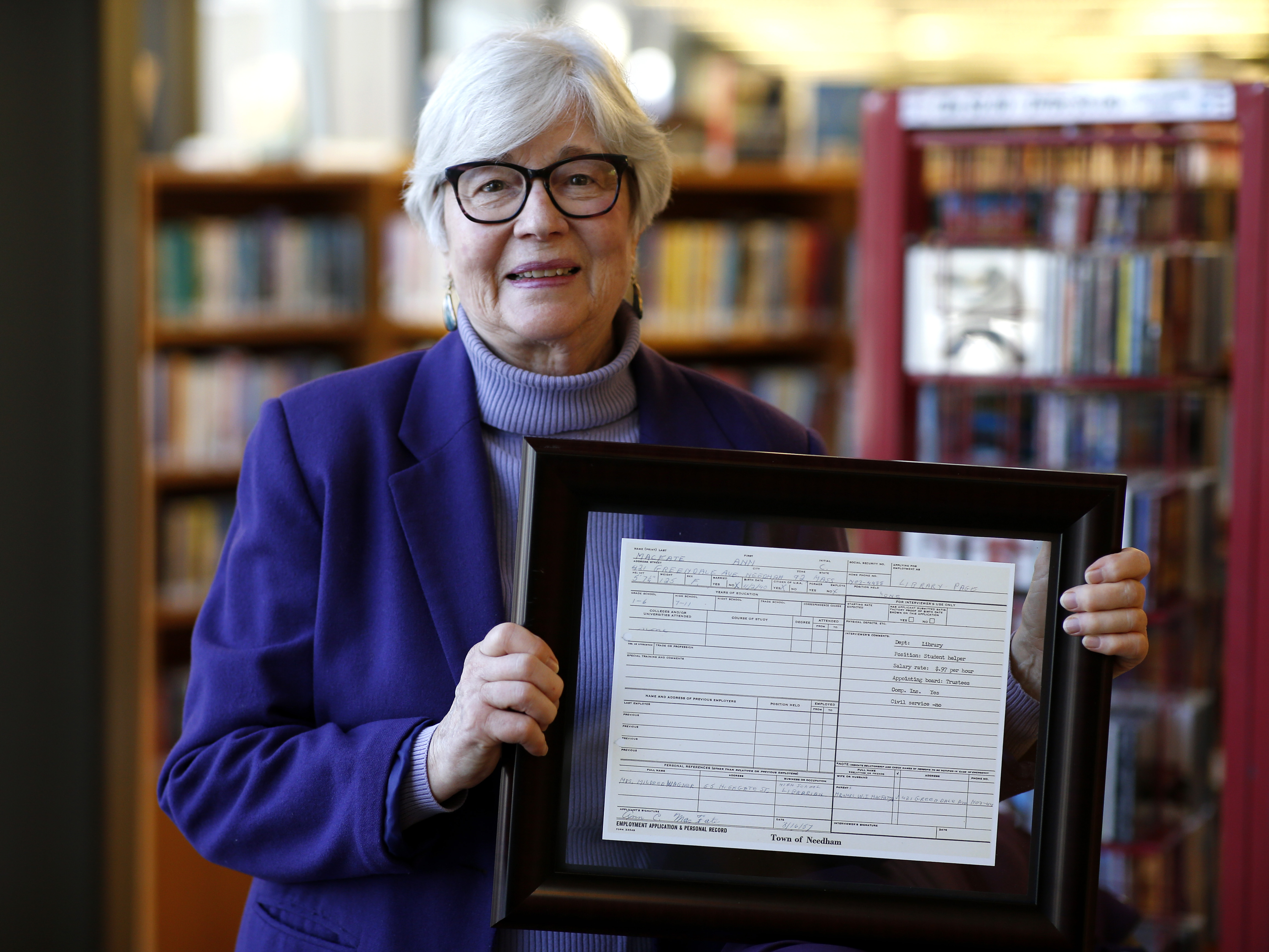 After a 65-year career, retired Needham library director returns to  volunteer - The Boston Globe