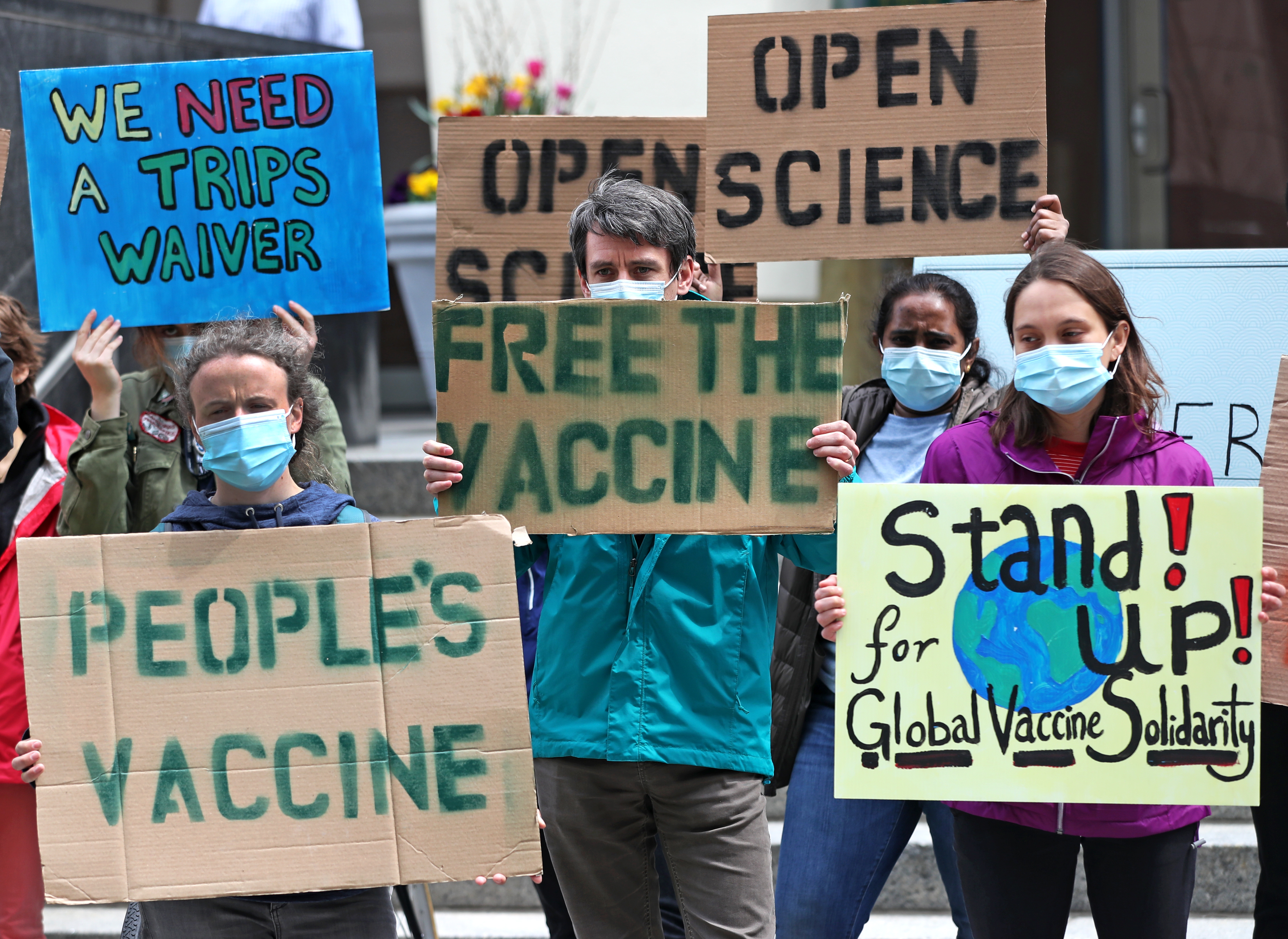 Protesters marched through Cambridge and rallied outside Moderna headquarters.