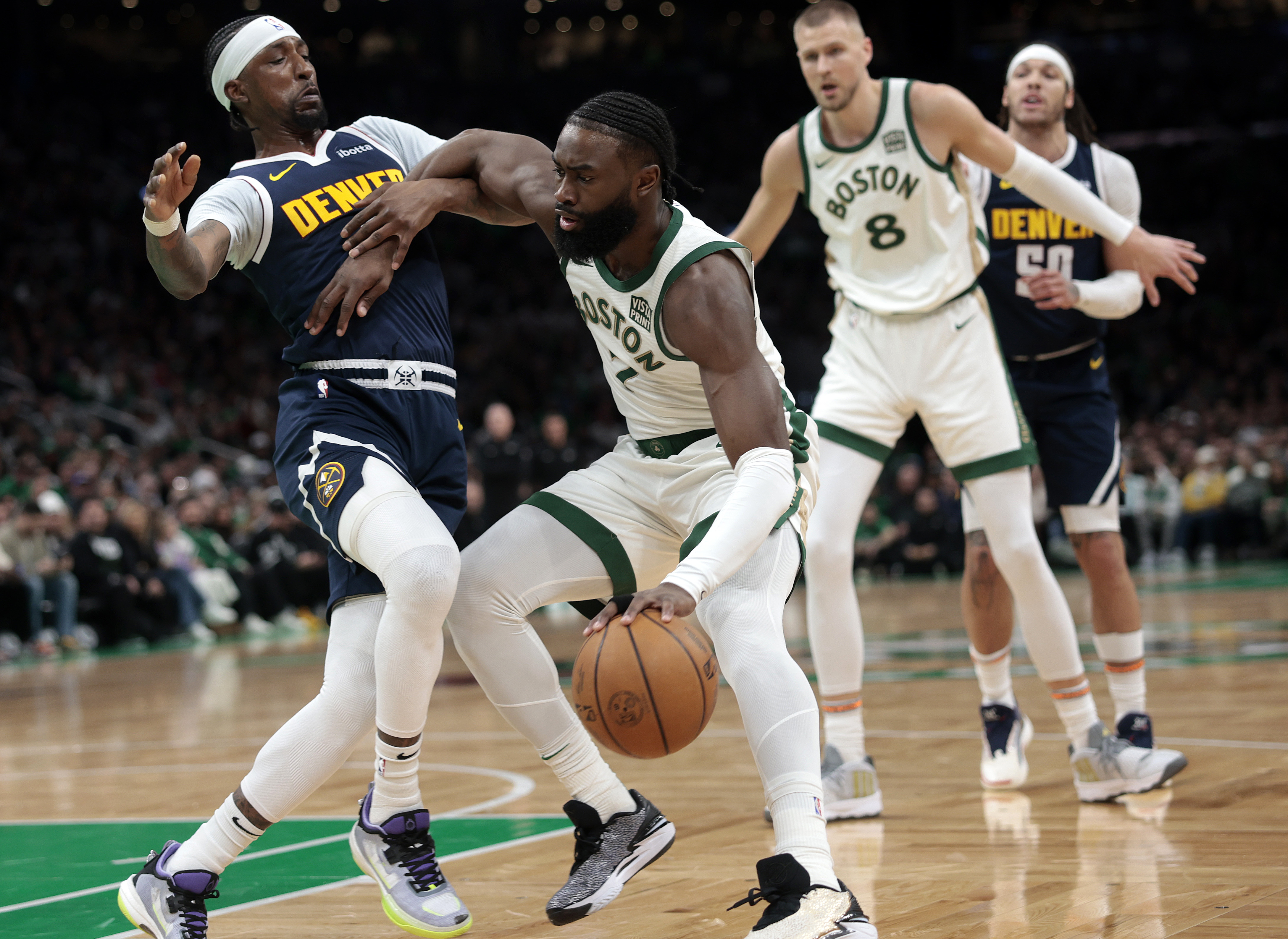 Celtics home streak ends vs. defending champion Nuggets