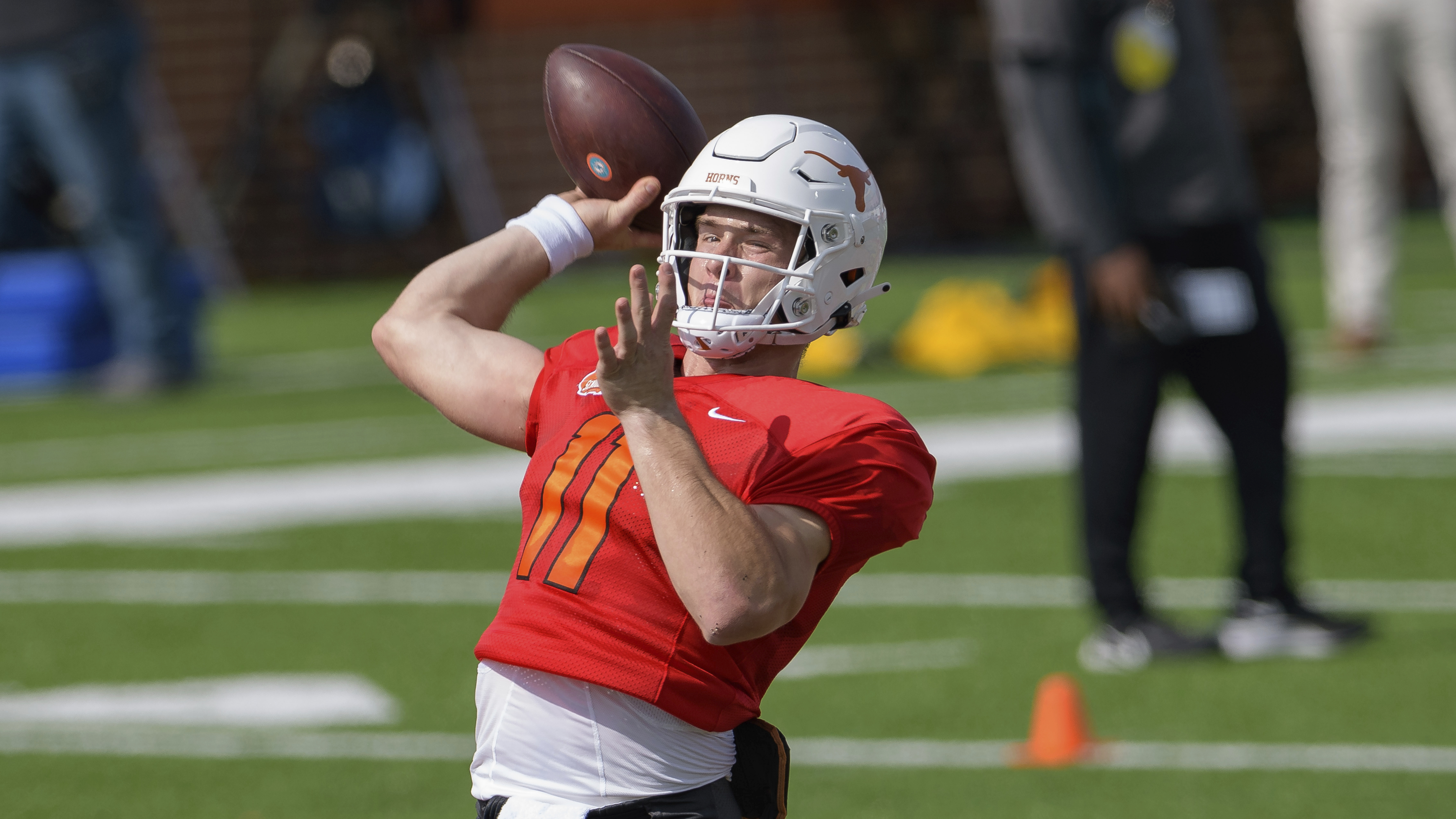 Sam Ehlinger of Texas throws during practice on Wednesday.