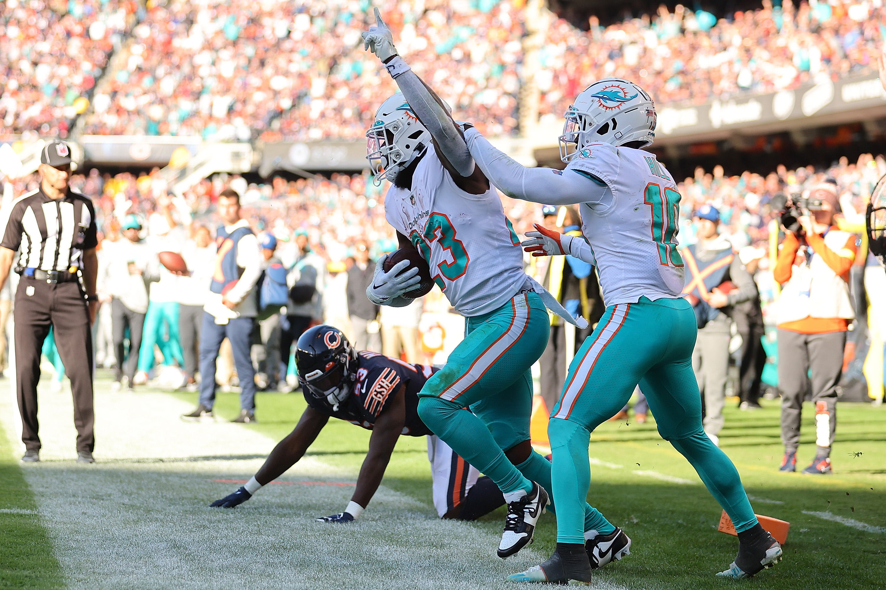 Justin Fields sets QB rushing record, but Dolphins air out Bears for third  straight win - The Boston Globe