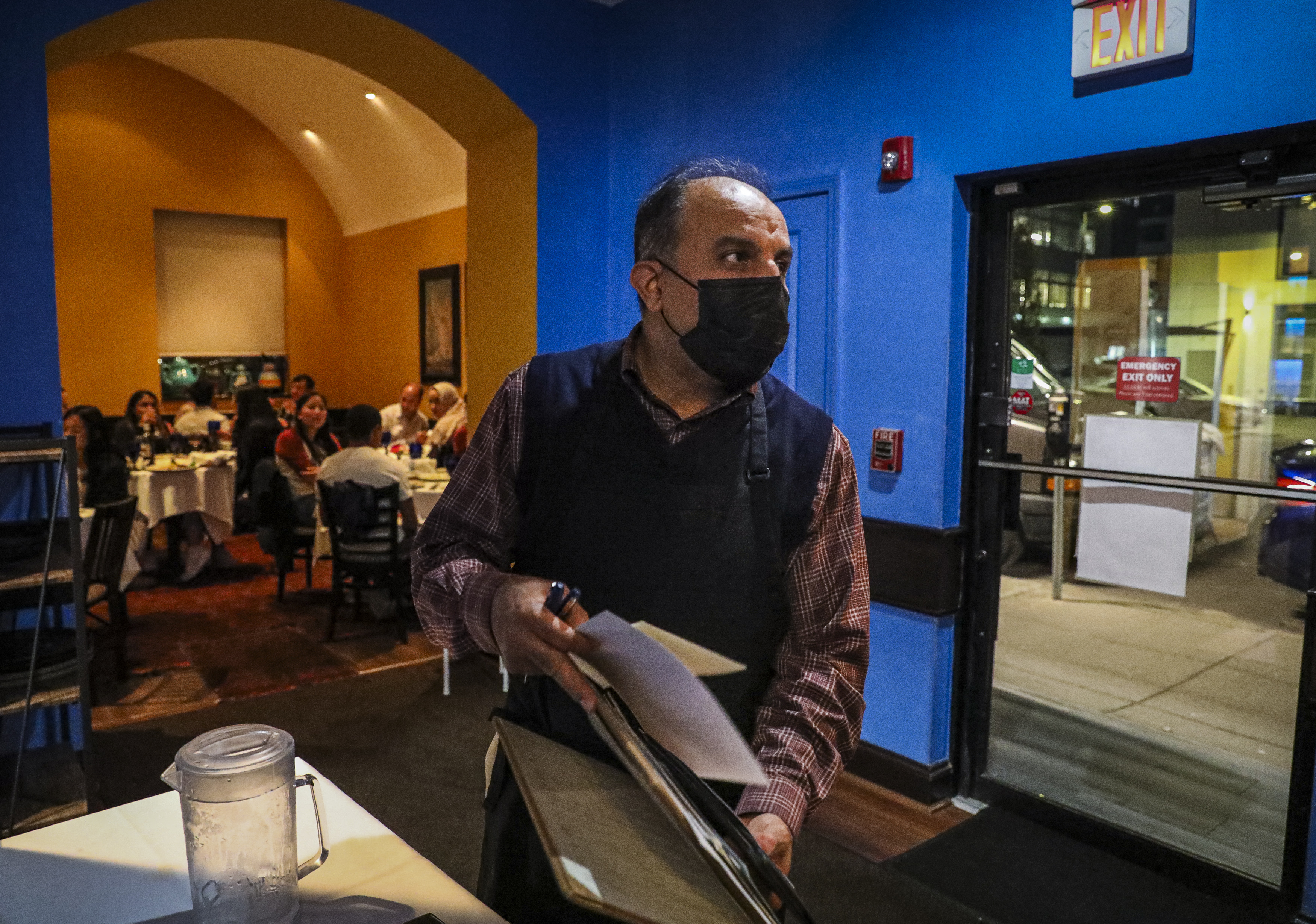 Ali Tokhi worked the Saturday night dinner rush at his restaurant.