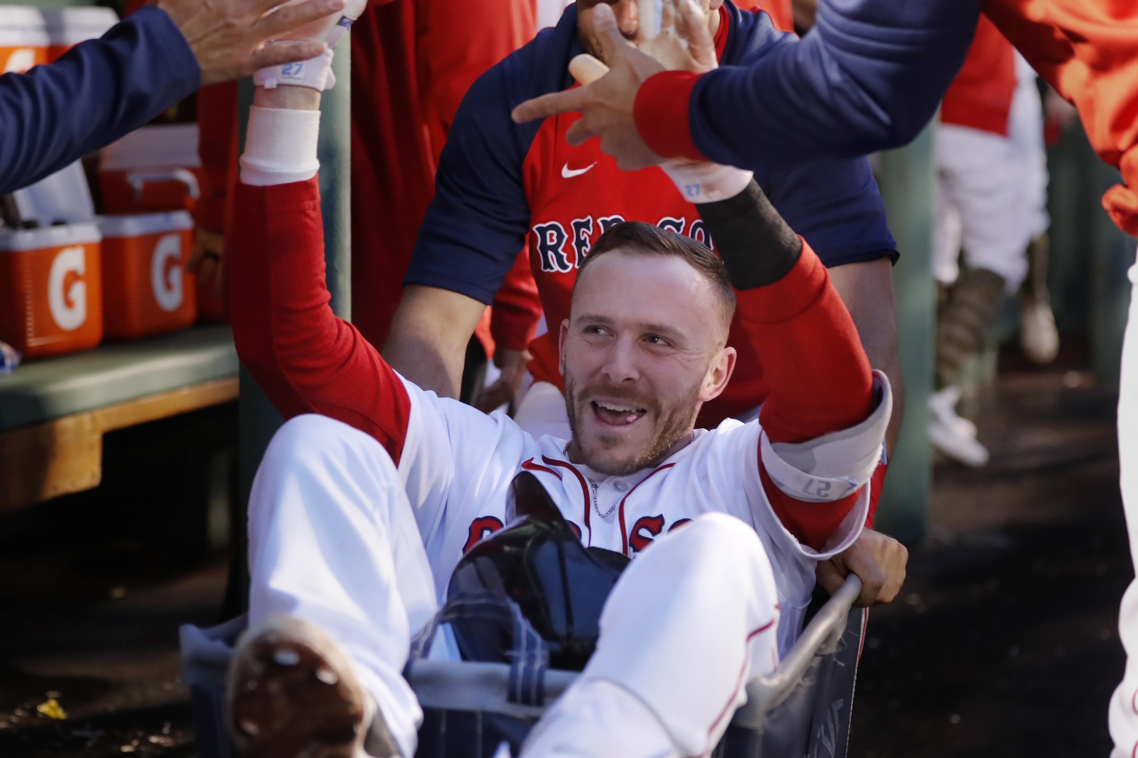 Two friends at Fenway made barehanded grabs over the Green Monster during  batting practice