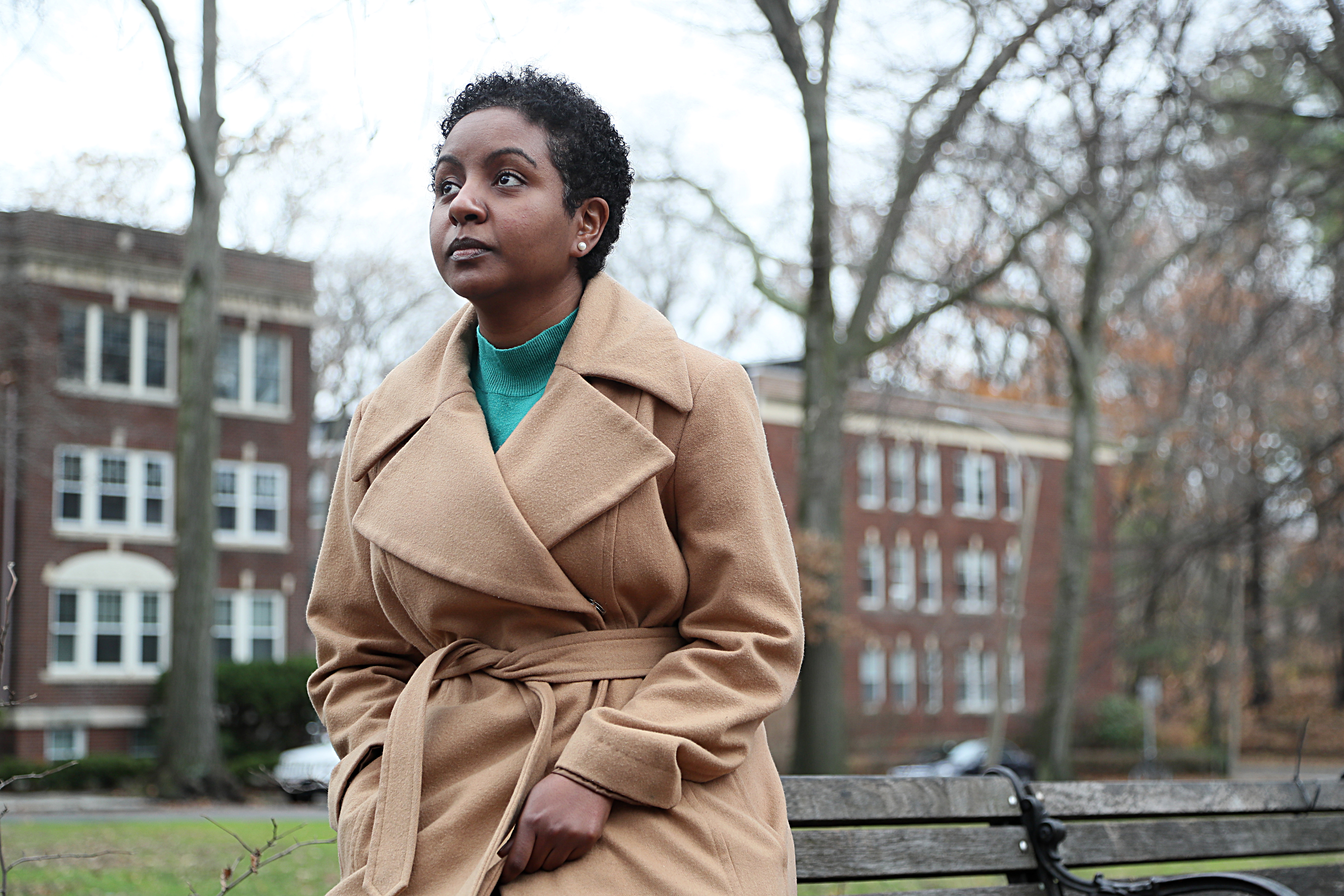 Dr. Sara Suliman, a tuberculosis immunologist turned COVID-19 diagnostics expert, is pictured in Brookline this month. Suliman watched the historic crowds at Black Lives Matter protests this summer with a conflicting mix of personal pride and professional concern.