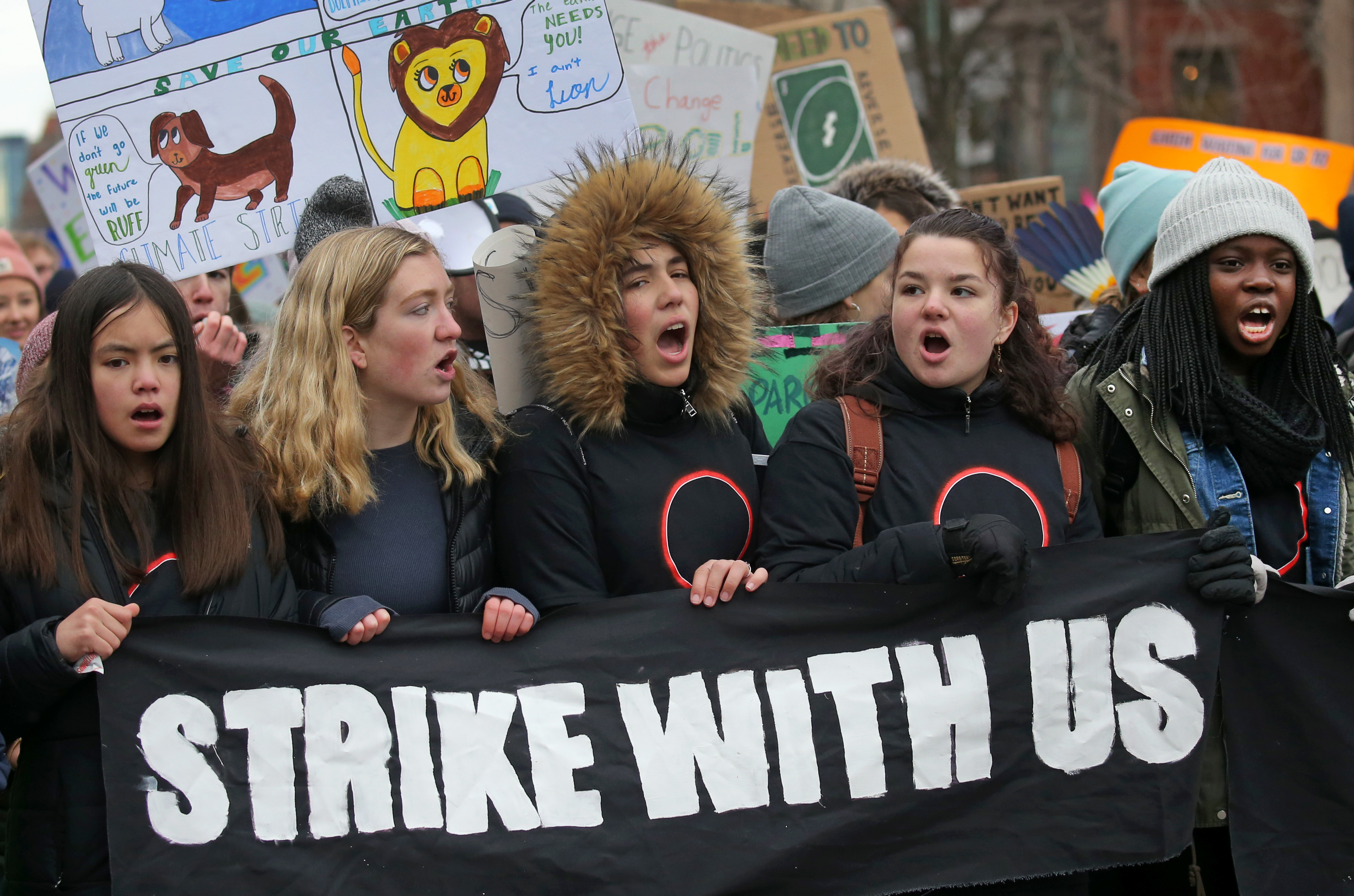 Protestors marching to the State House, Dec. 16, 2019. The crowd of mostly young people had gathered on Copley Plaza to call for action on climate change, then marched to Beacon Hill.