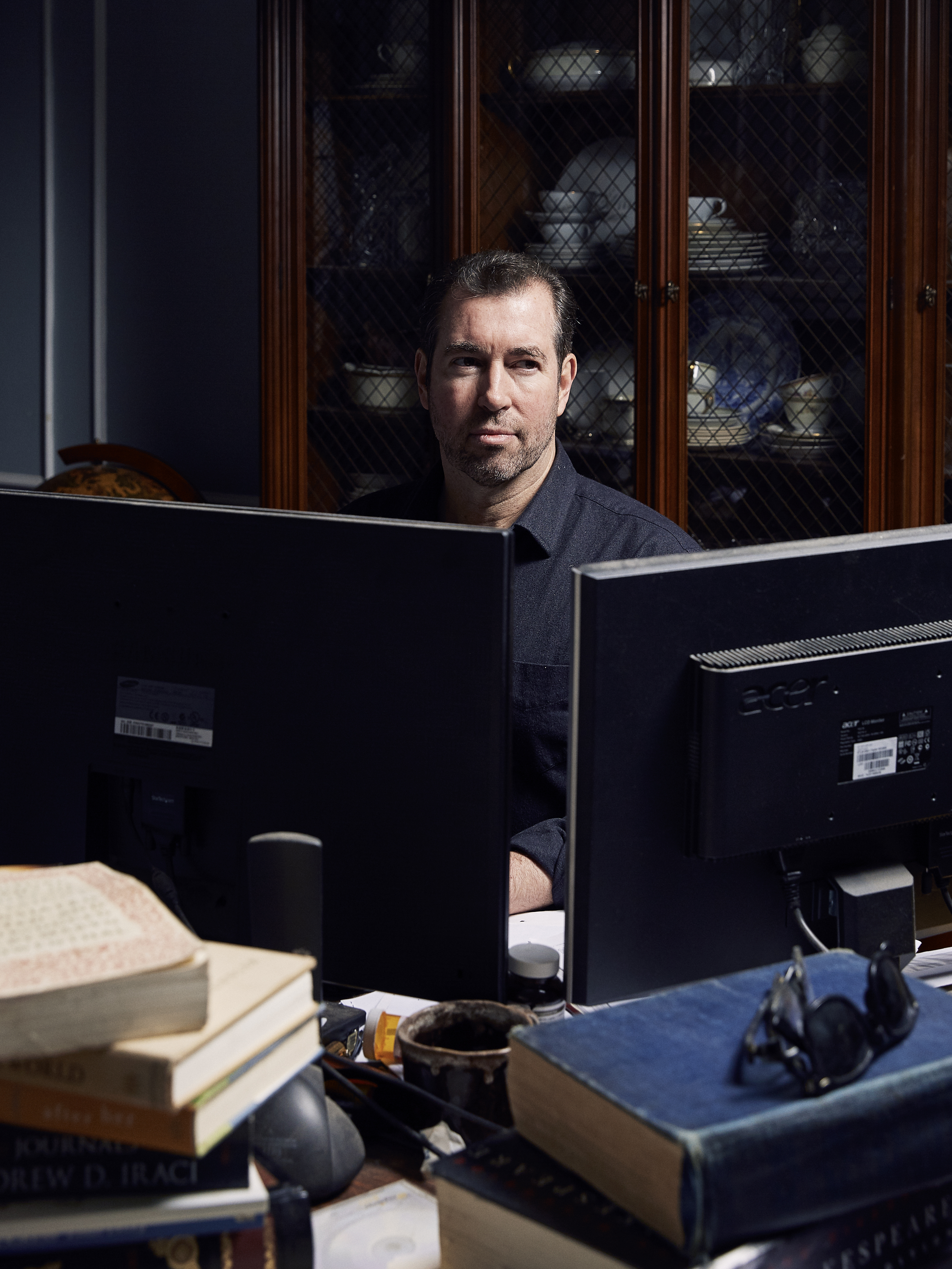 Dennis McCarthy at his workspace in his New Hampshire dining room.