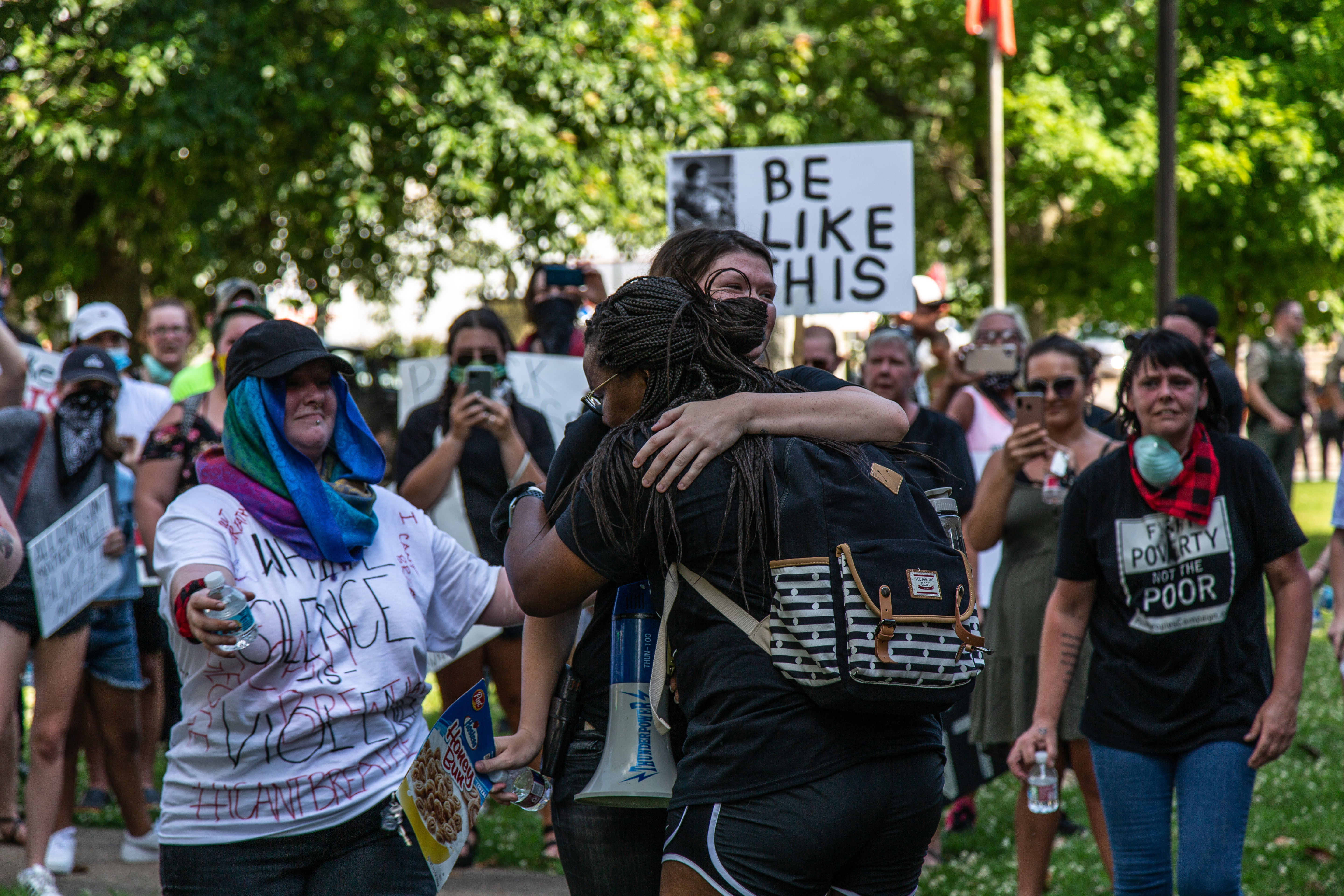 Organizers hugged Maya Hood as she broke down in tears while speaking to protesters.