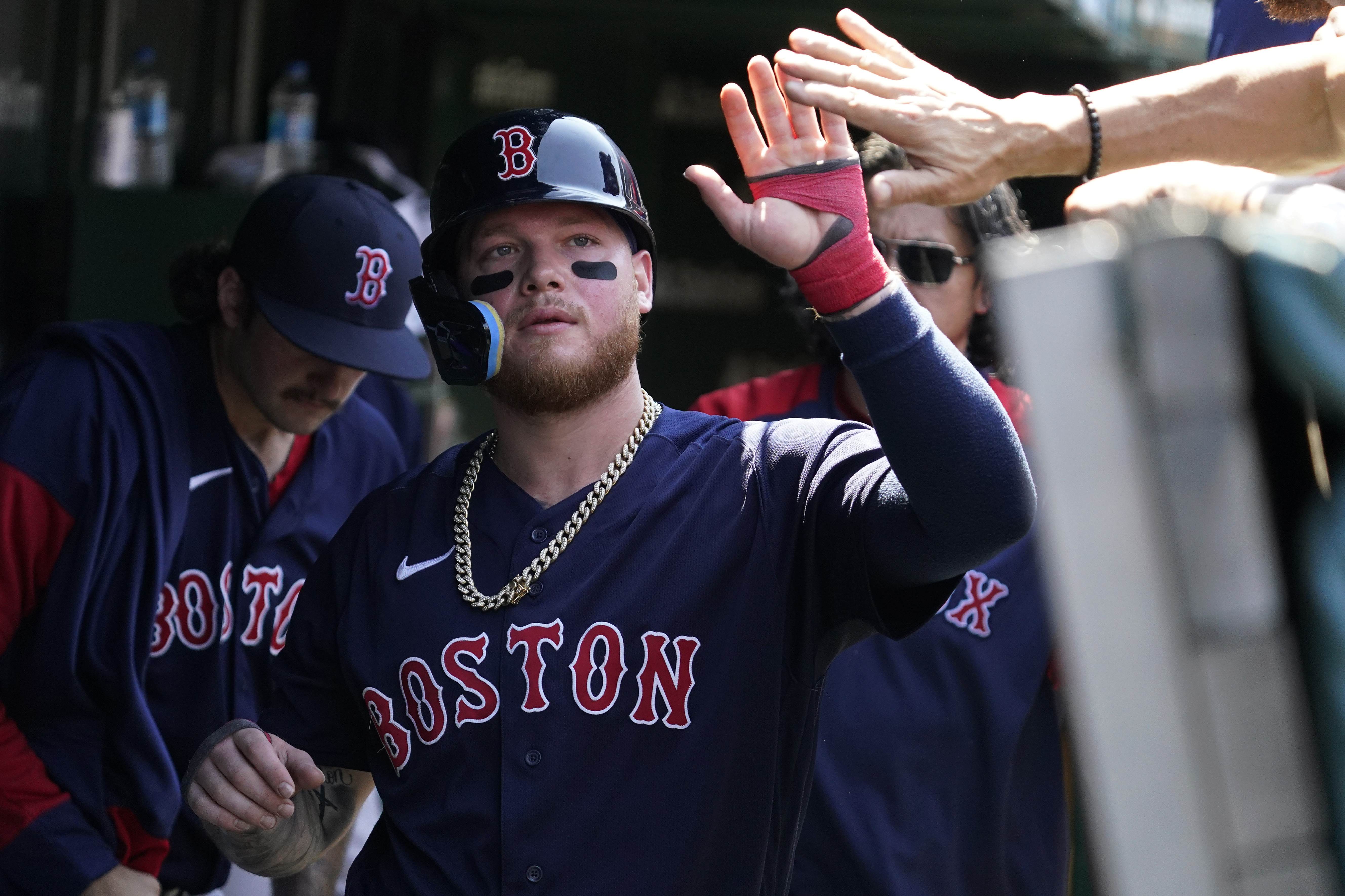 Boston Red Sox fans react to team's 17-4 record while wearing