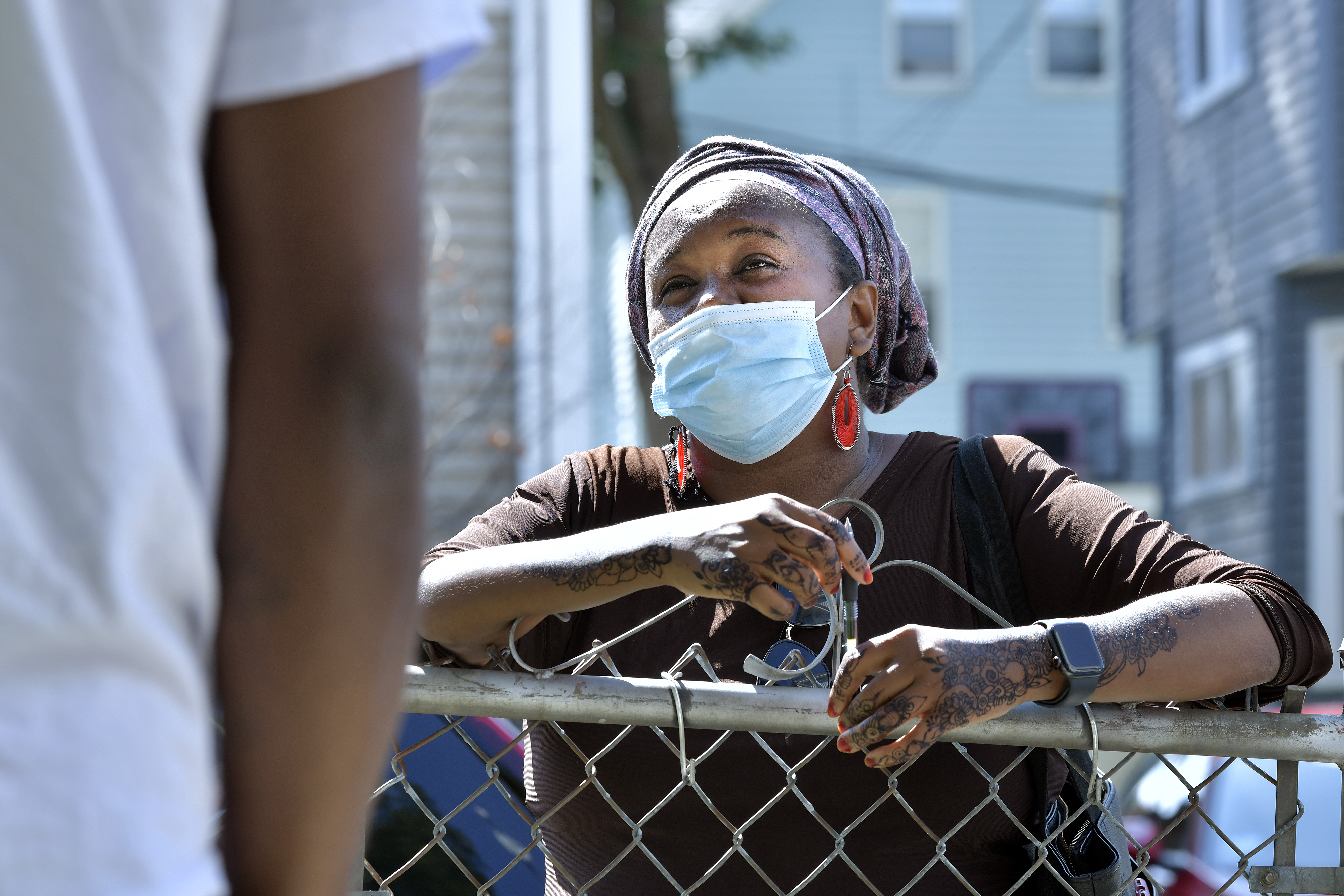 Deeqo Jibril, a candidate for City Council in District Four, spoke to a supporter.