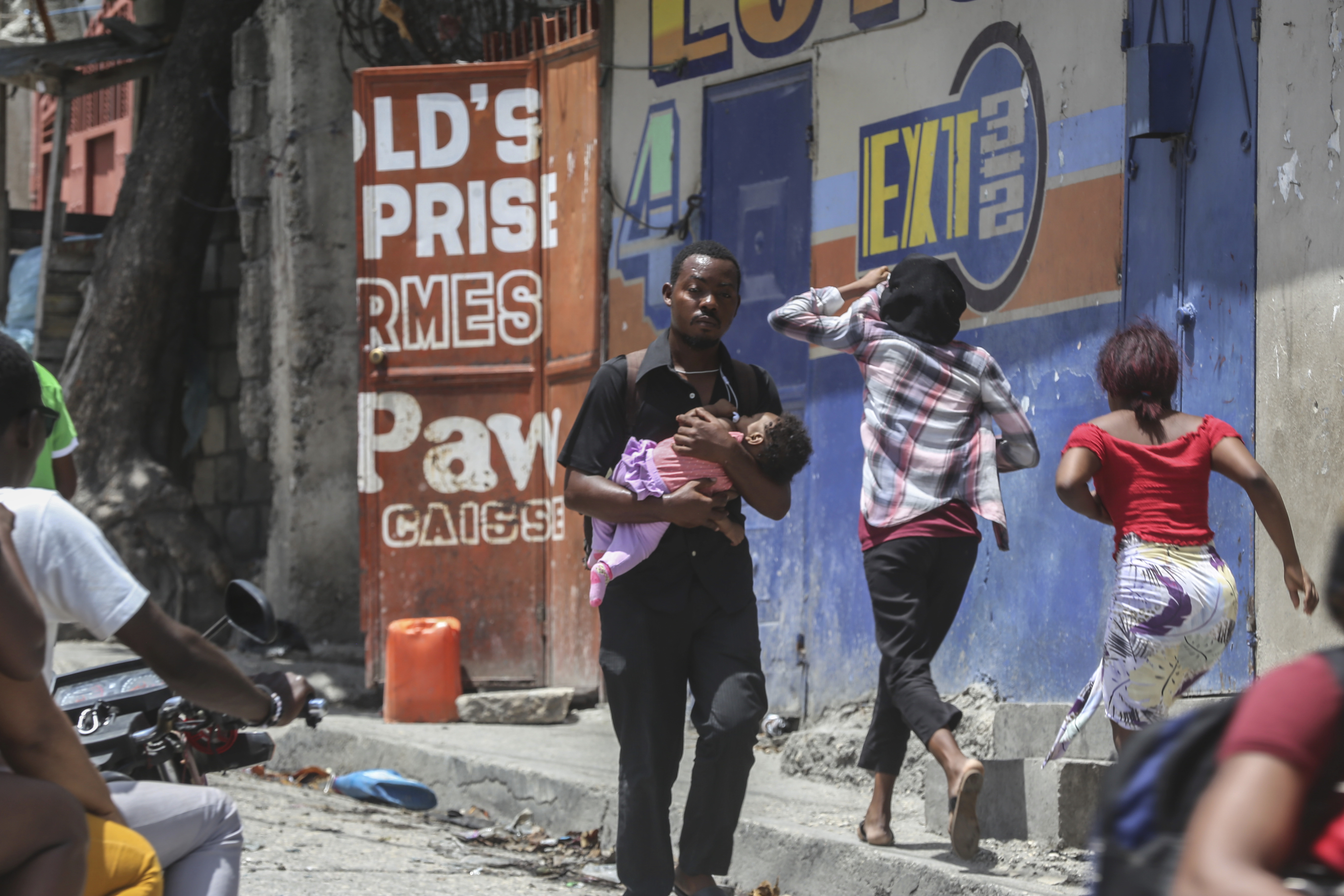 Thousands protest in Haiti as UN discusses troop request