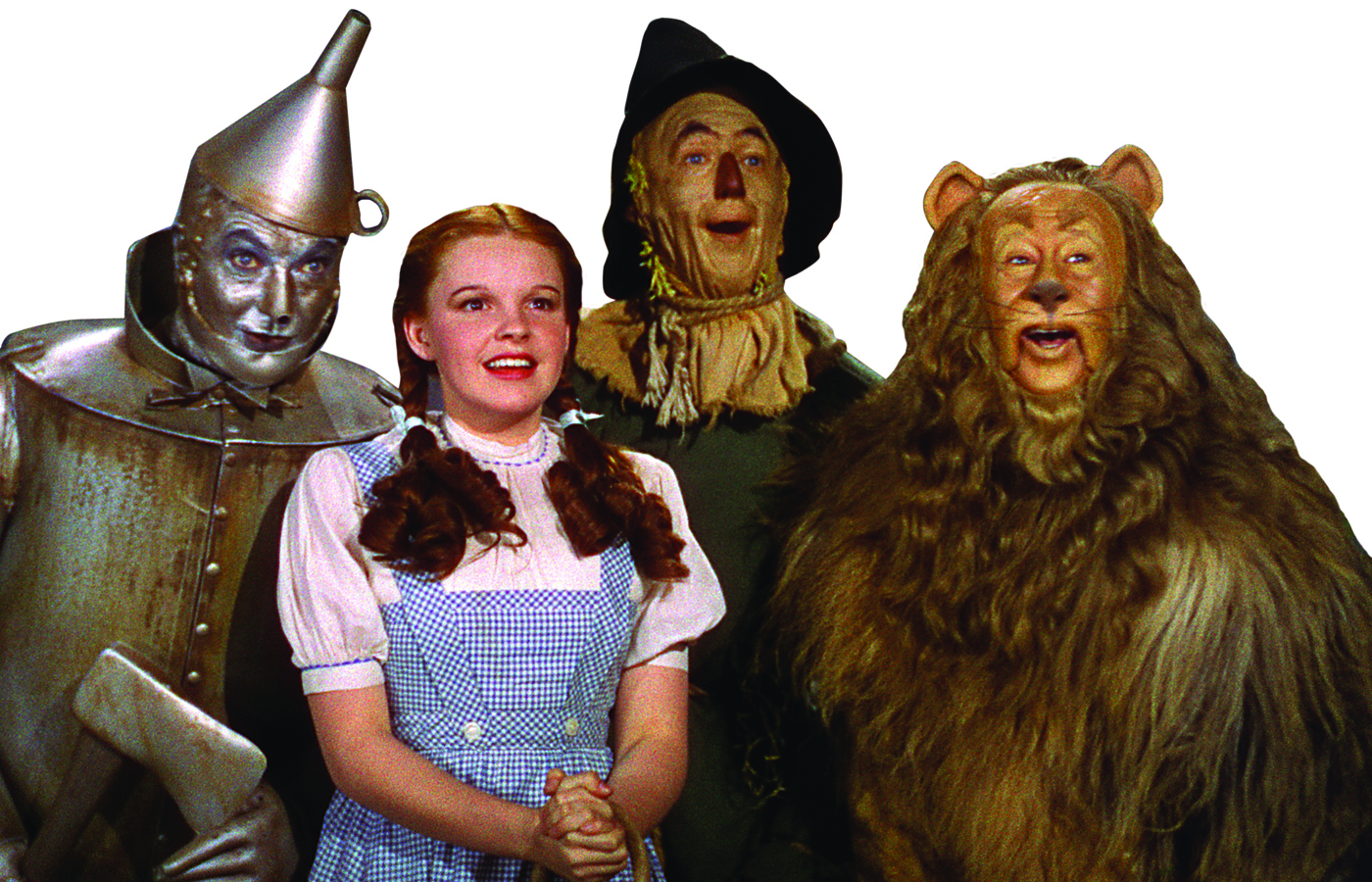 Jack Haley as The Tin Man, Judy Garland as Dorothy, Ray Bolger as The Scarecrow, and Bert Lahr as The Cowardly Lion in "The Wizard of Oz."
