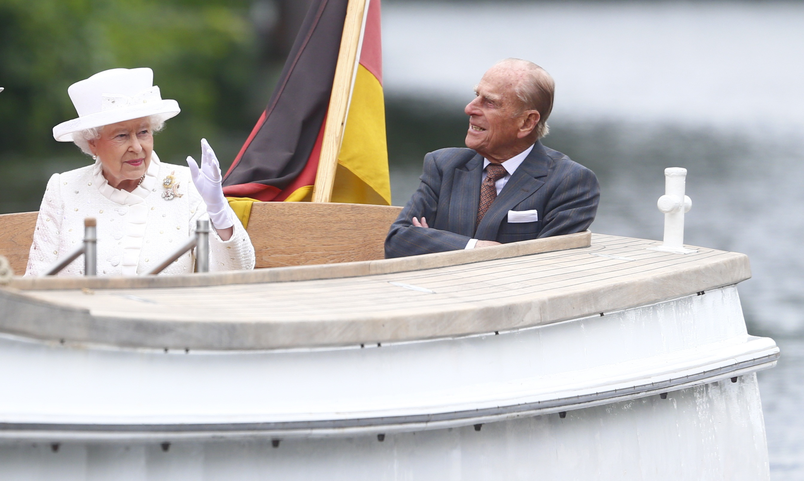 In this June 24, 2015 file photo, Britain's Queen Elizabeth II and Prince Philip traveled by boat on the Spree river in Berlin, Germany.