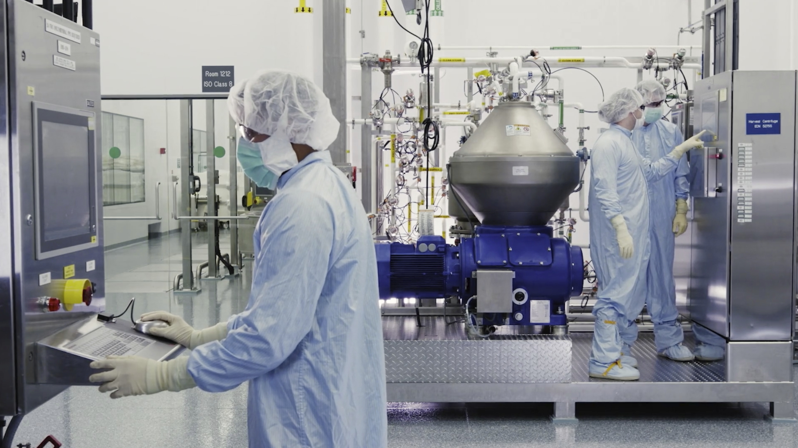 Scientists worked with a bioreactor at a Regeneron facility in New York state, for efforts on an experimental coronavirus antibody drug. Antibodies are proteins the body makes when an infection occurs; they attach to a virus and help the immune system eliminate it.