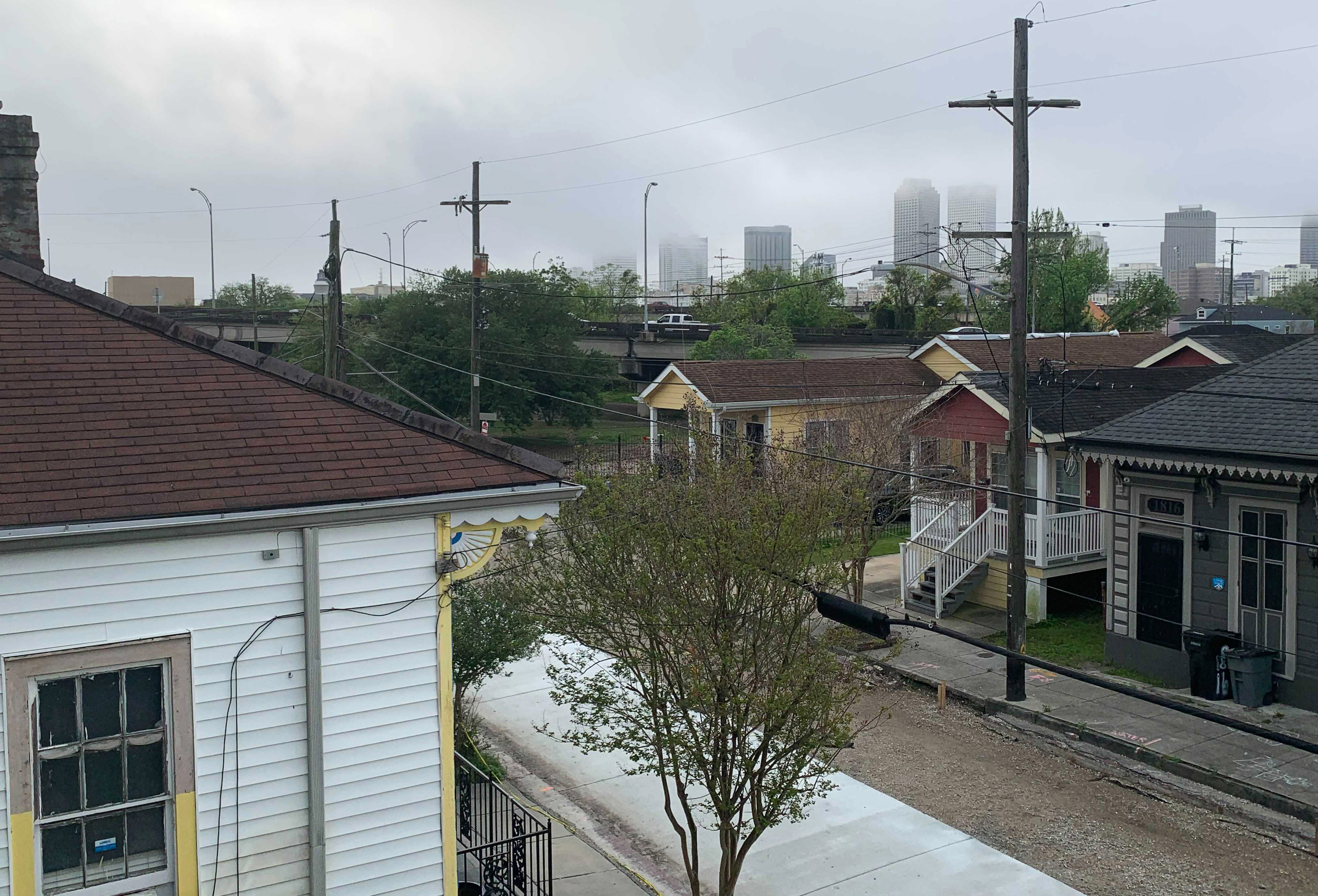 A ramp to the Claiborne Expressway is visible from Amy Stelly's second-floor porch. She is waging a campaign for the highway's removal, an effort that gained a considerable boost Wednesday when the White House named the highway an example of a historic inequity that President Biden’s new infrastructure plan would seek to address through billions in new spending.