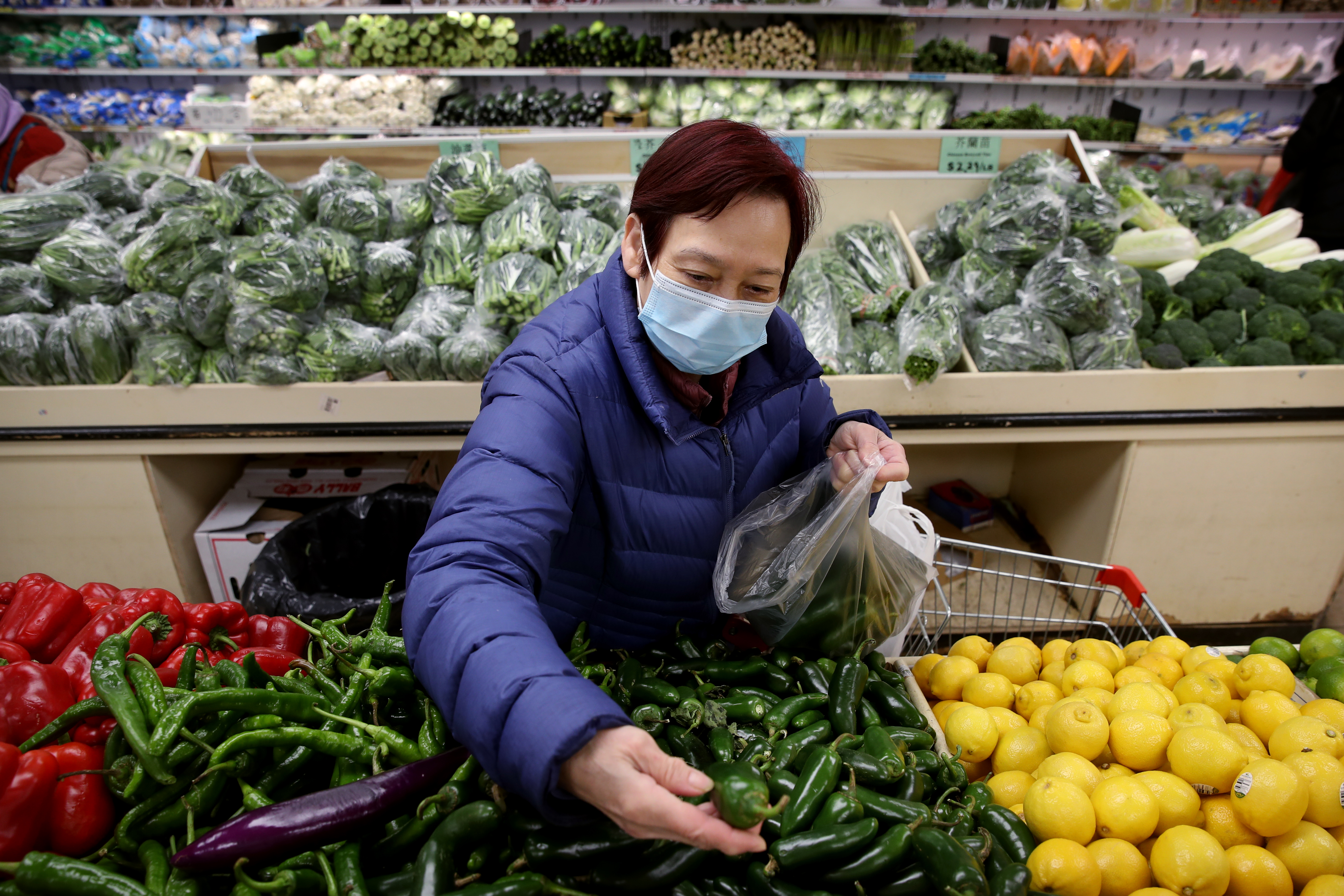 Mui Ling Leung, owner of Peach Farm restaurant, shops at Jia Ho Supermarket in Chinatown.