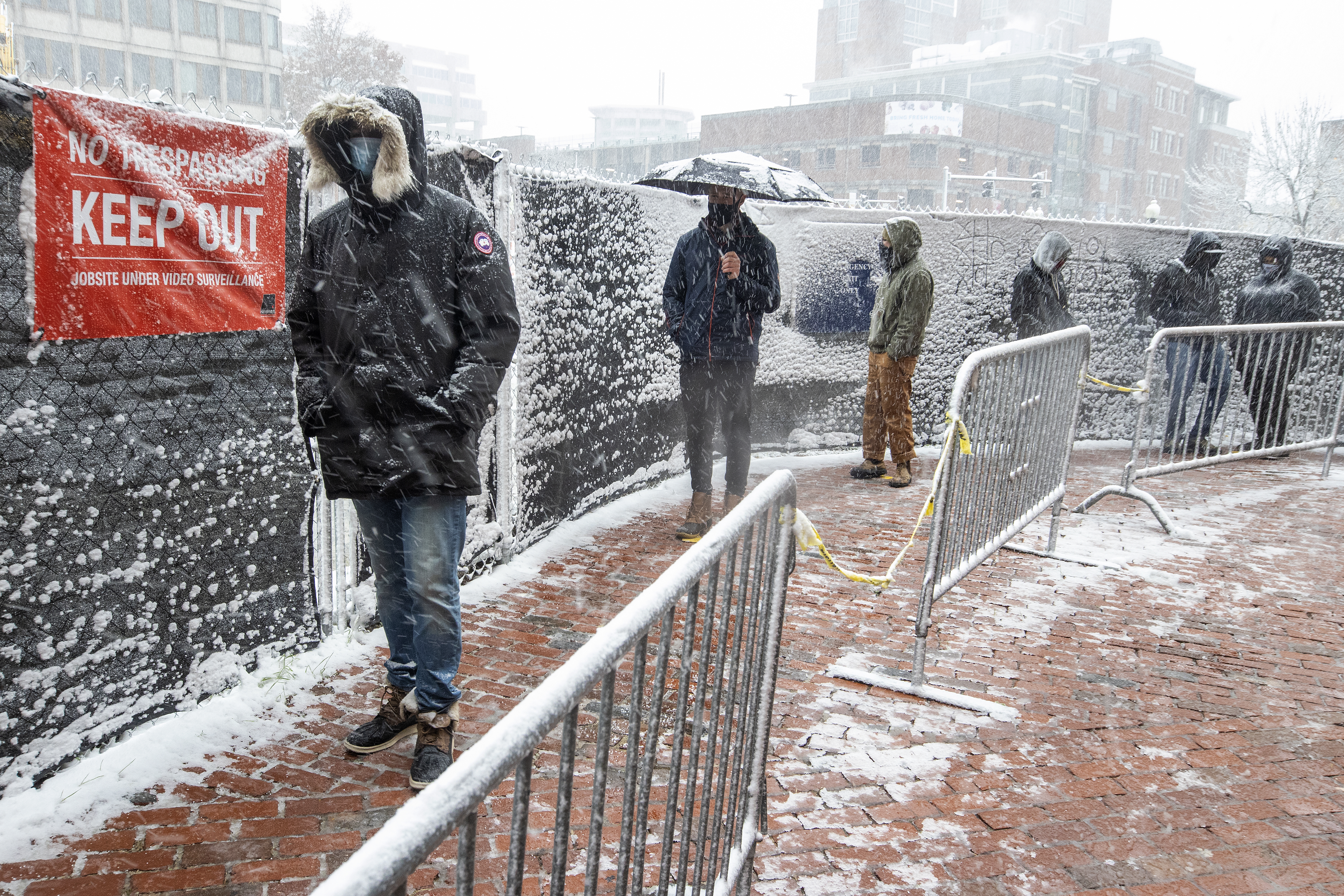 Early voting at City Hall Plaza in the snow. Some people did not want to be photographed because they were supposed to be working.