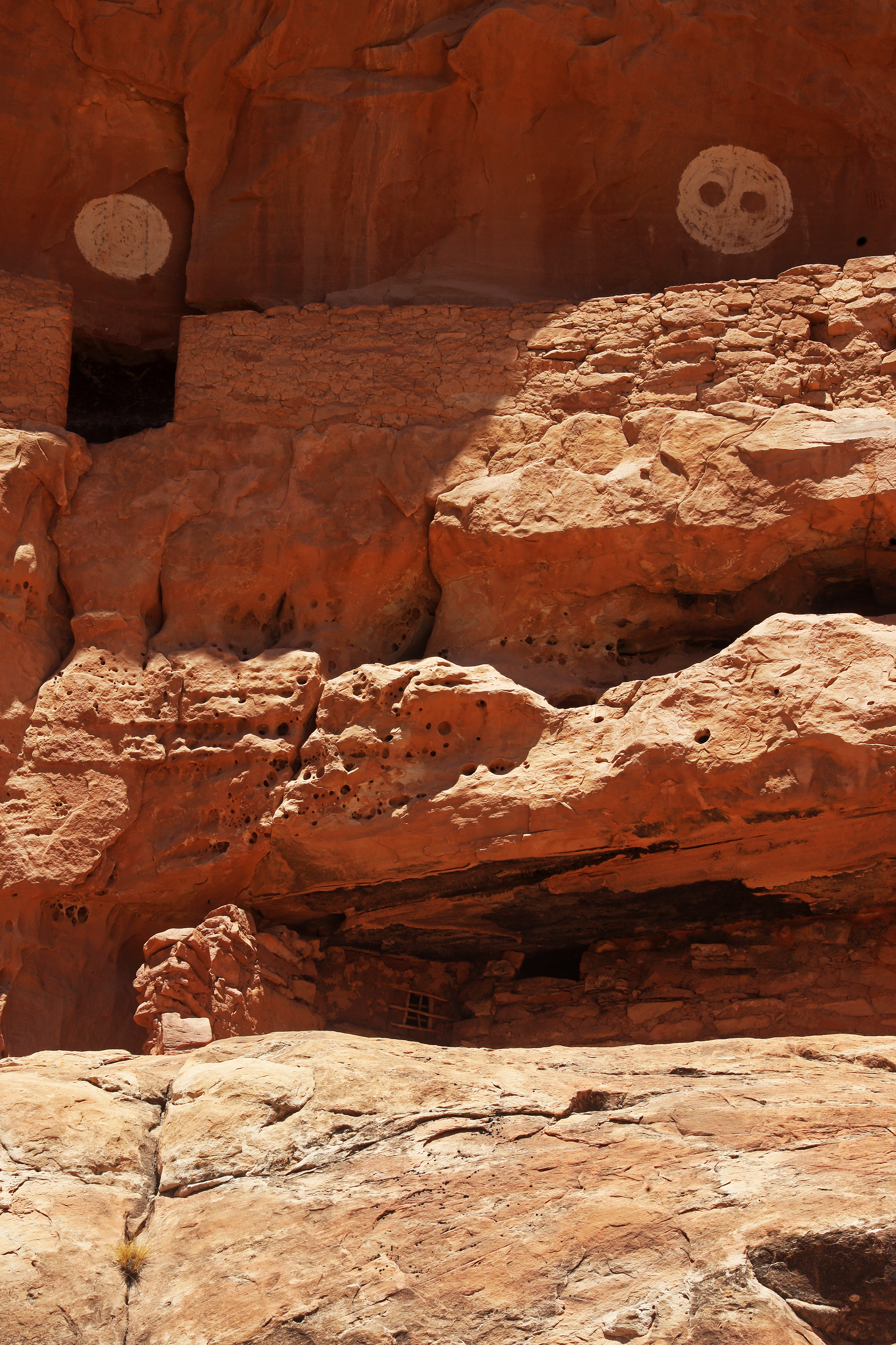 Pictographs hover over the Jailhouse home in Bullet Canyon.