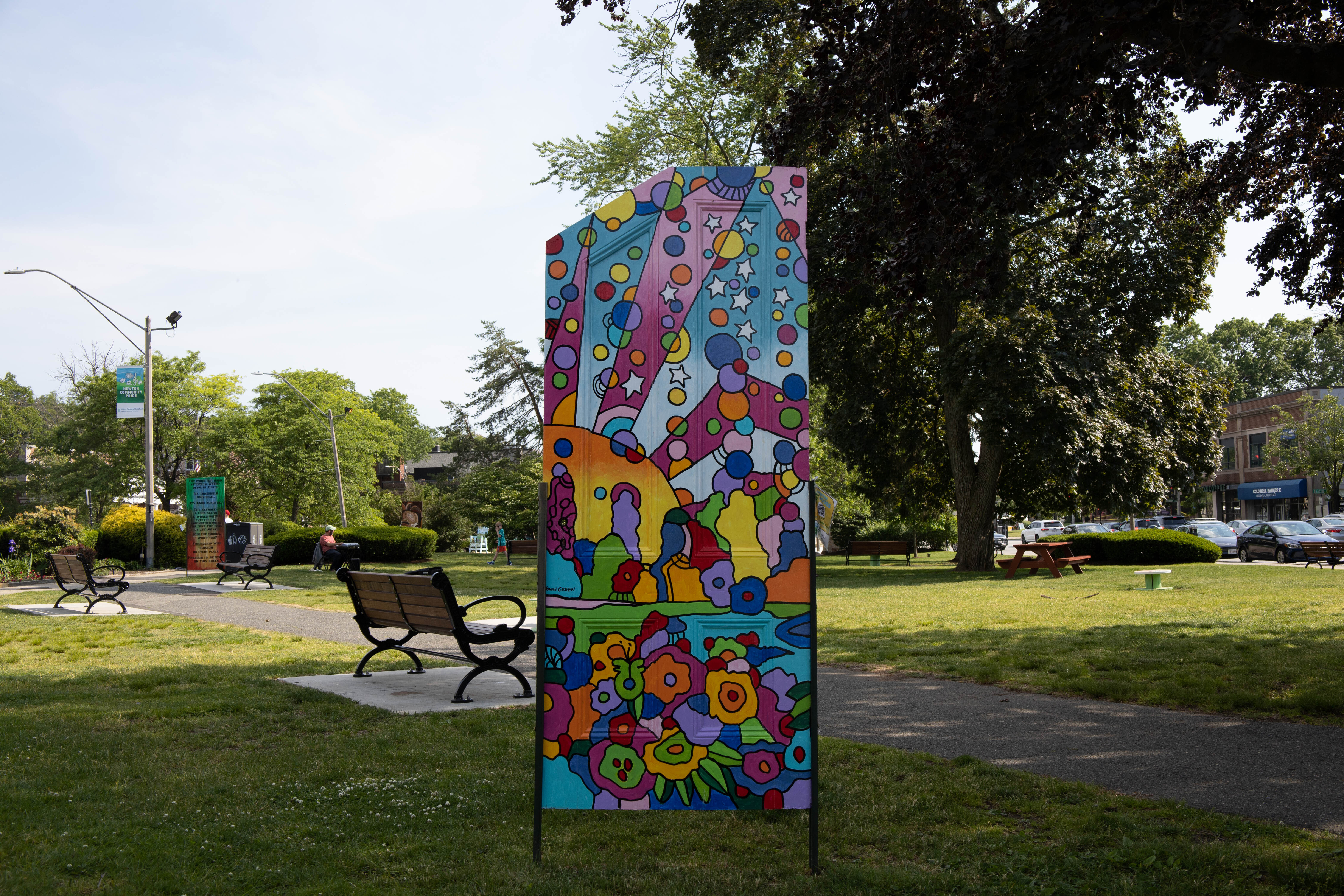 "Creating in Nature" by Howie Green is part of a Newton Community Pride art project featuring painted doors around the city. 