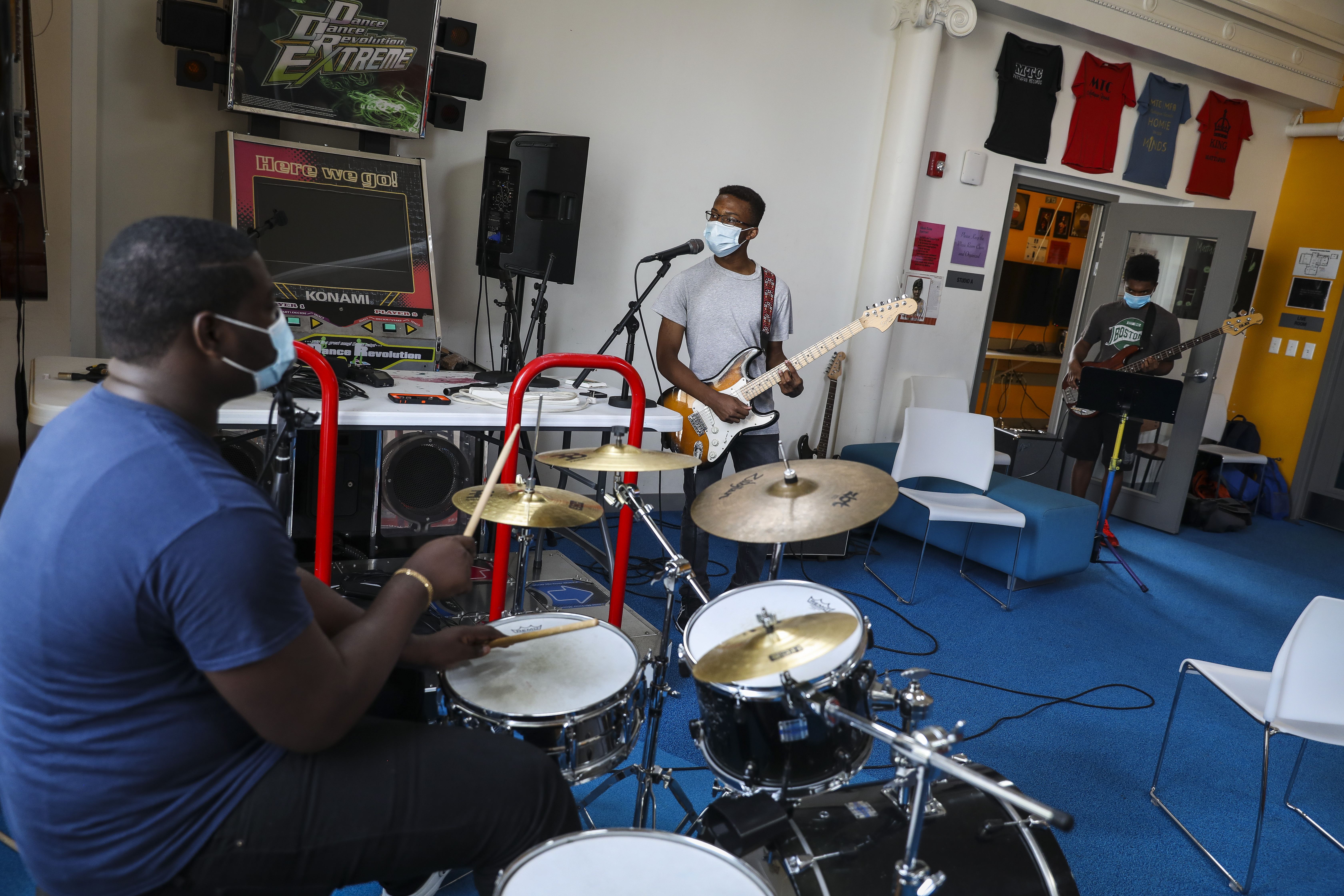 Mattapan Records members (from left) Peterly Durosca, Eric Hines, and Jahmel Axell practiced at the Mattapan Teen Center.