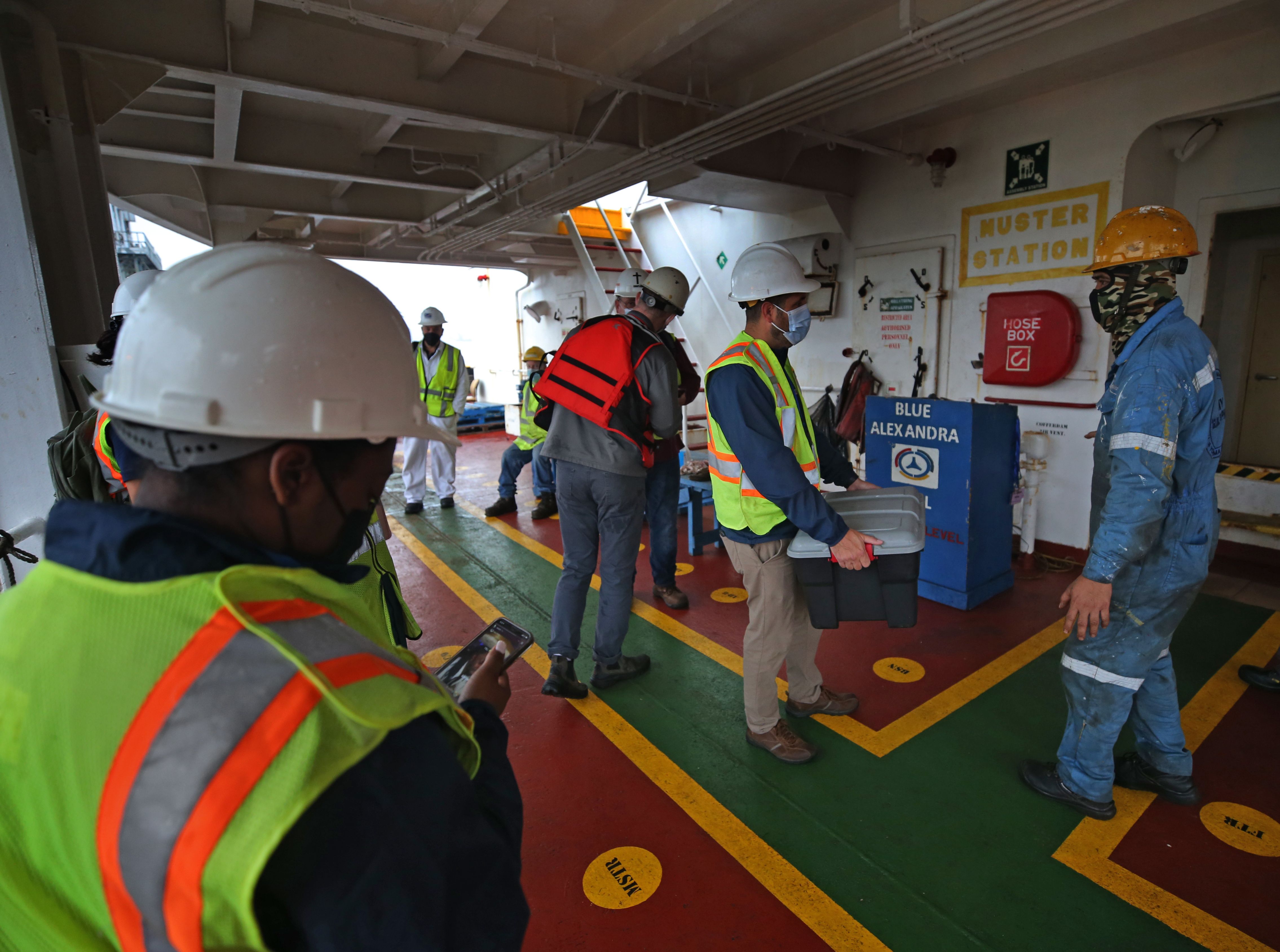 Members of Cataldo Ambulance Services and local maritime ministries members went aboard the Blue Alexandra, a bulk carrier picking up scrap metal in Everett, to get the crew vaccinated.