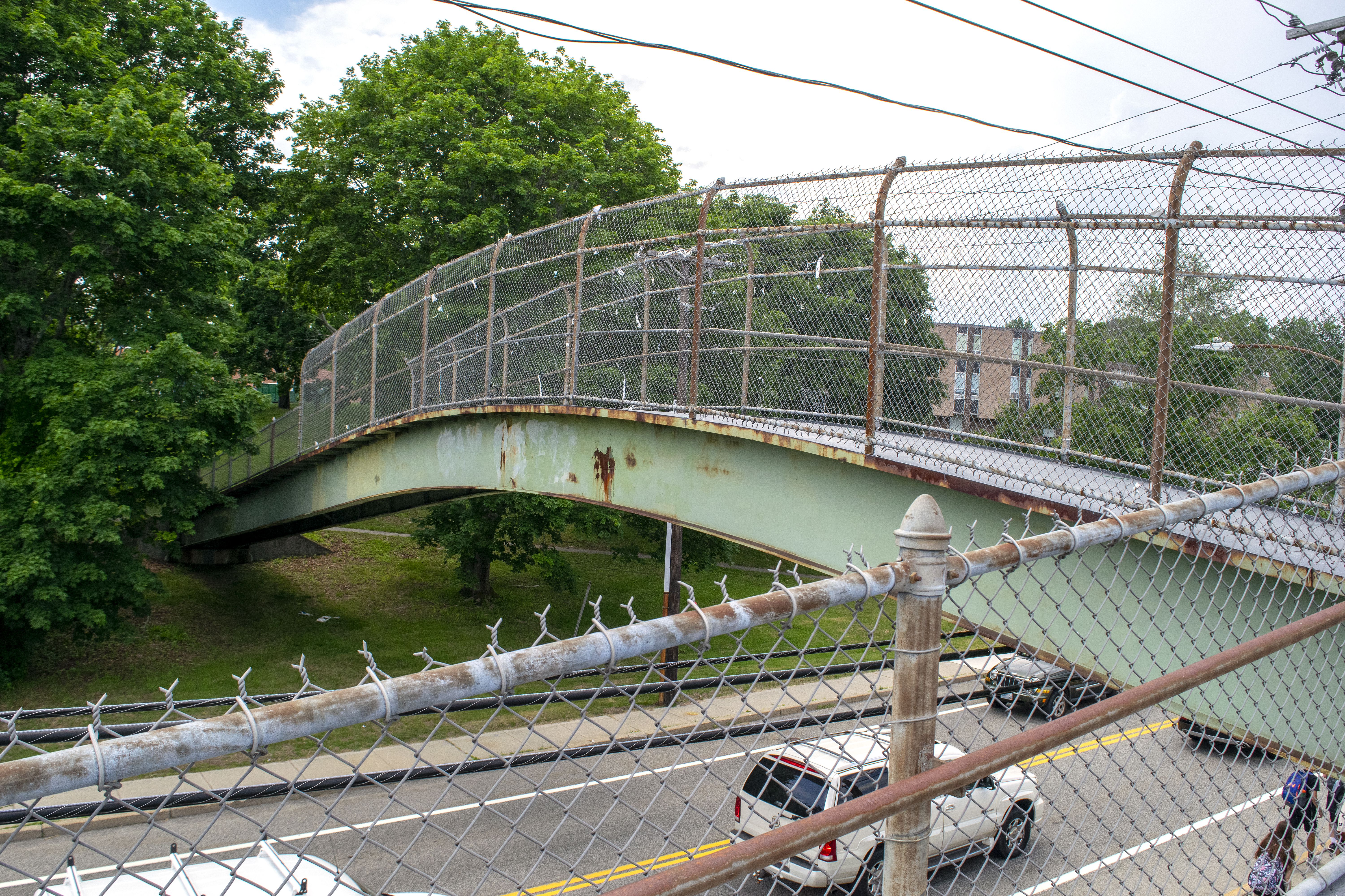 The Cumberland High School pedestrian bridge was recently resurfaced, but students prefer to cross Mendon Road at the crosswalk, tying up traffic and enraging some residents.