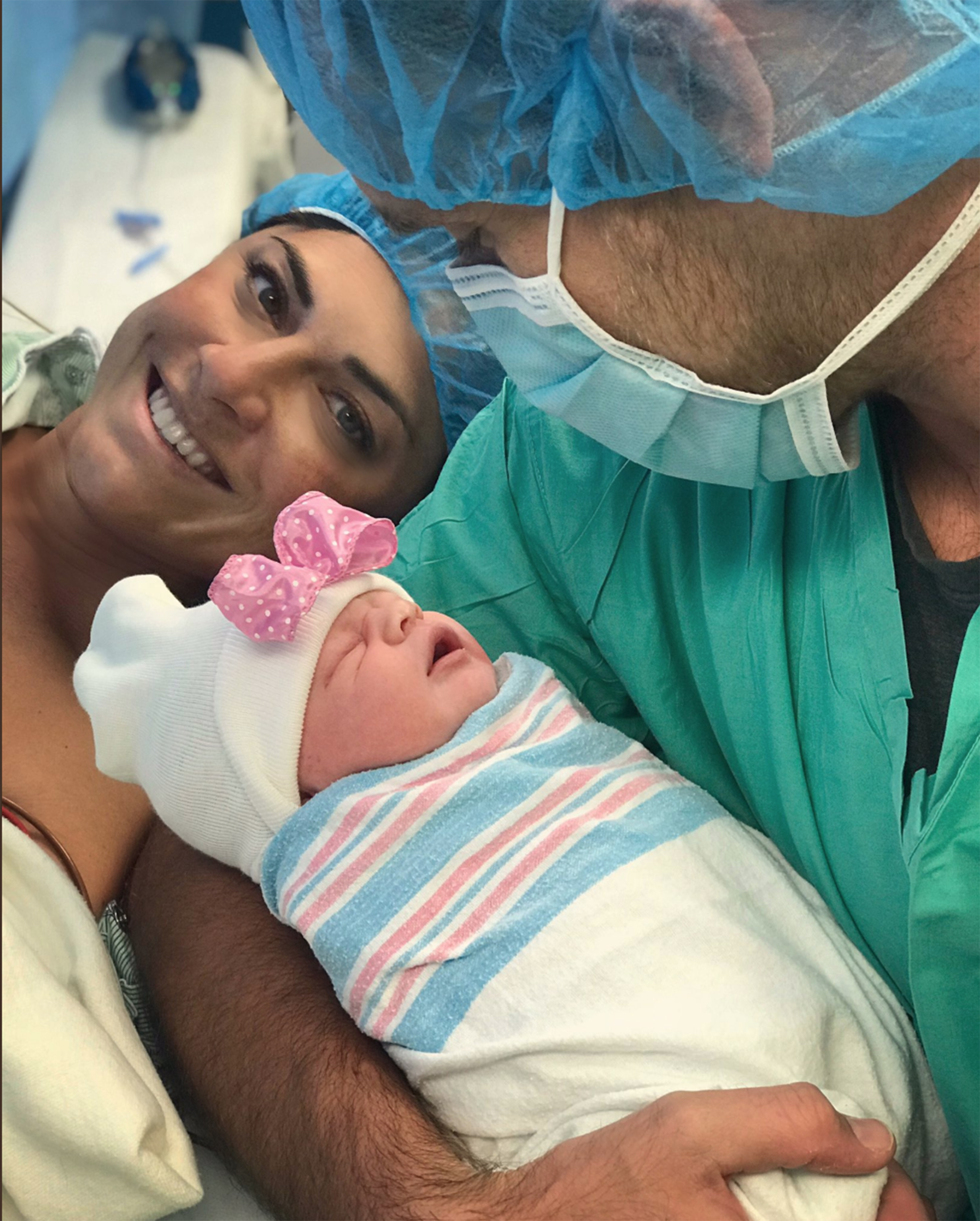 Dell and Middlebrooks with their daughter, Madison, born on Oct. 11, 2018.