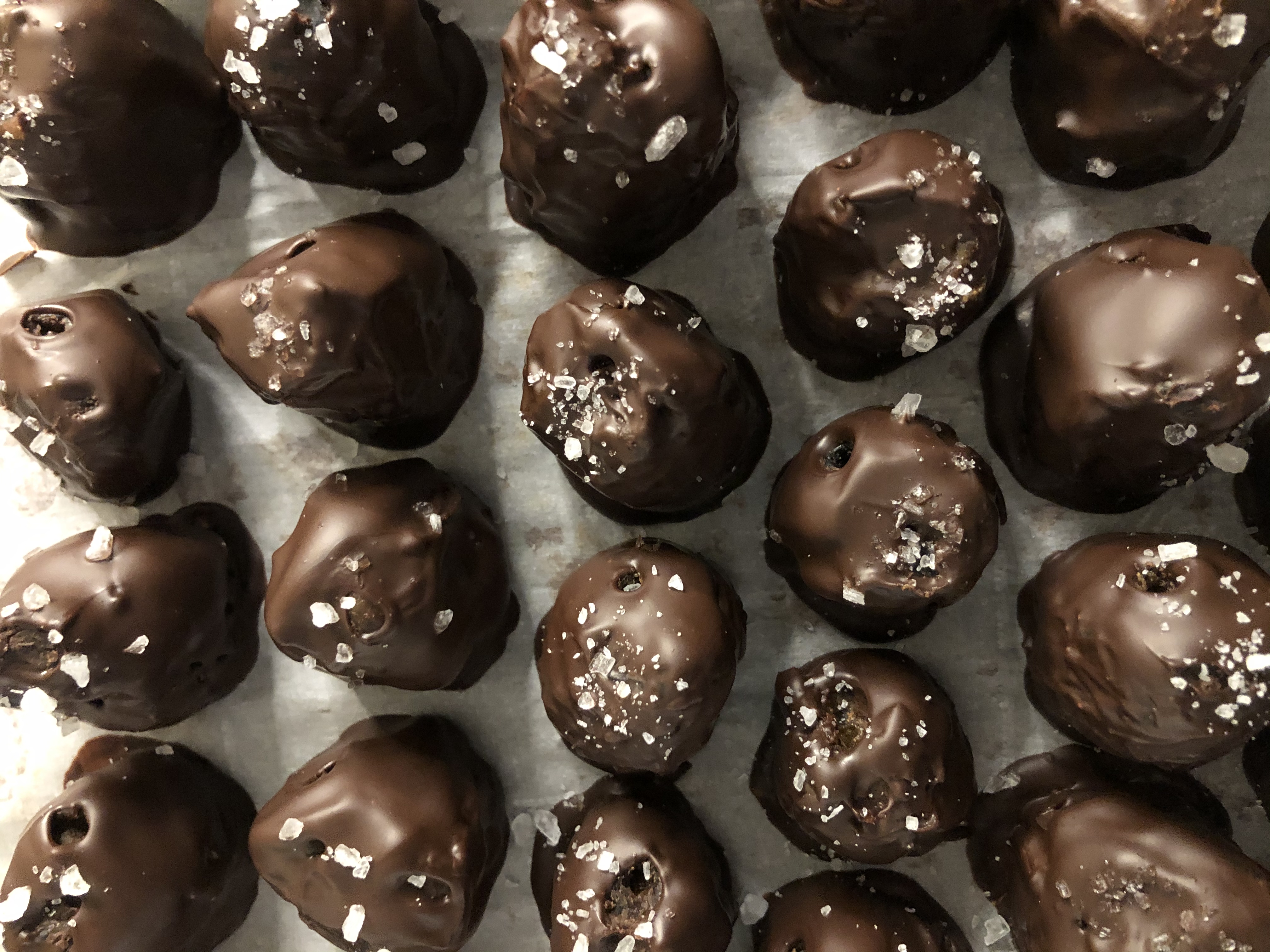Chooclate Medjool Dates filled with a spiced sunflower butter.