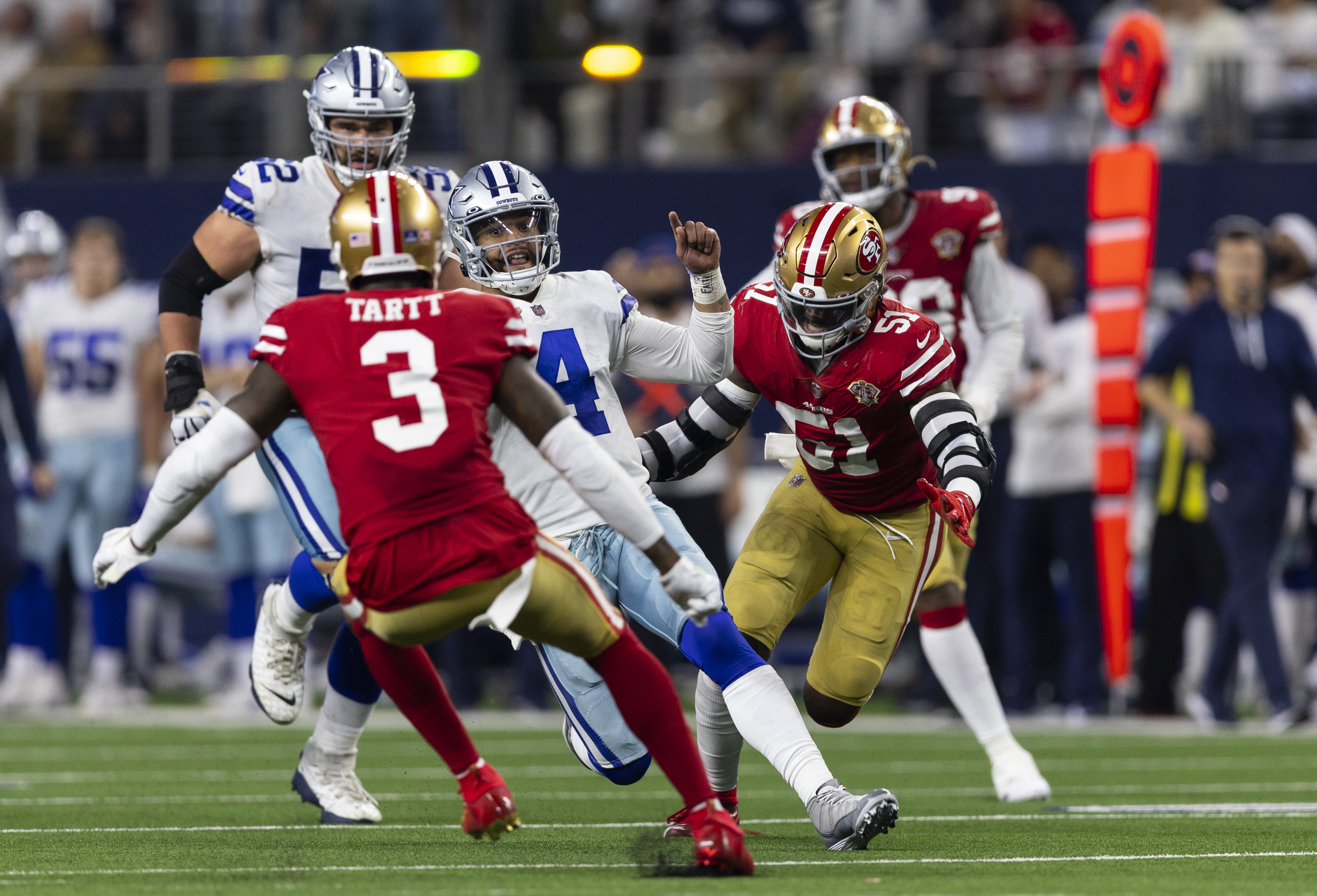 49ers hang on over Cowboys 23-17 in chaotic wild-card finish