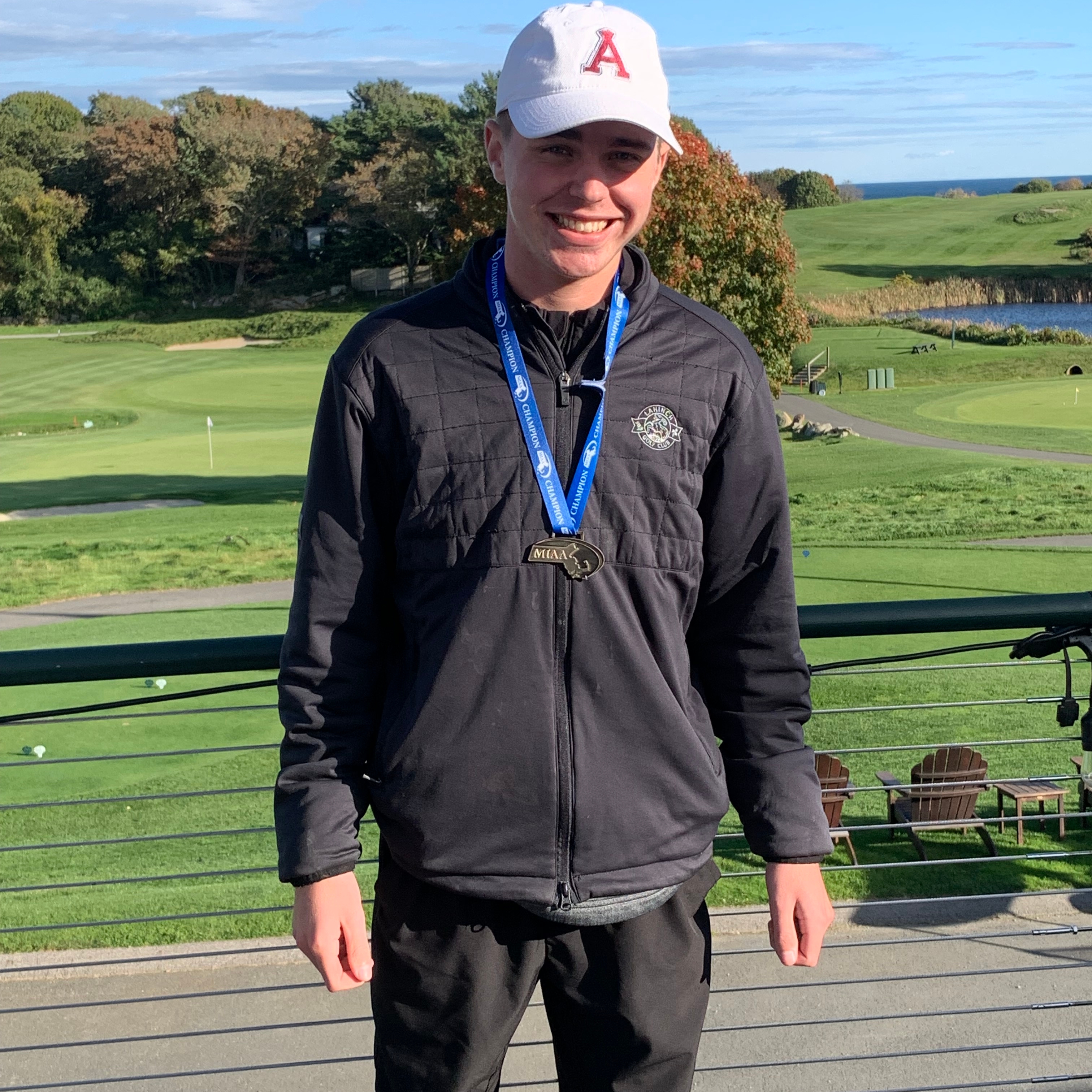 With his confident play around the greens, Arlington High senior Michael Scheschareg carded a 7-over 76 at Bass Rocks GC to earn medalist honors at the Division 1 North championship.