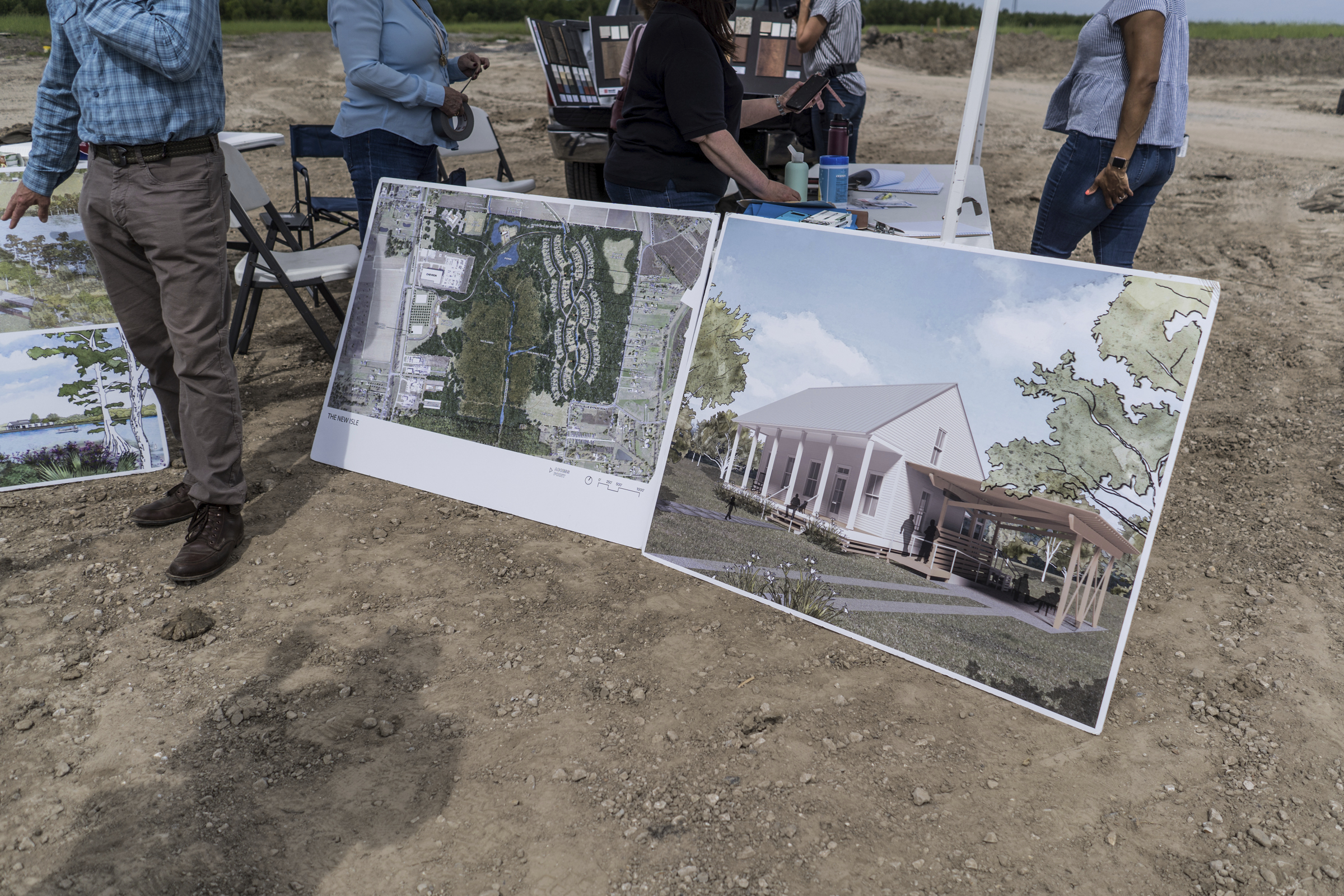 Housing renderings were displayed in April on the site of the new development for residents of Isle de Jean Charles who are leaving the eroding and sinking island.