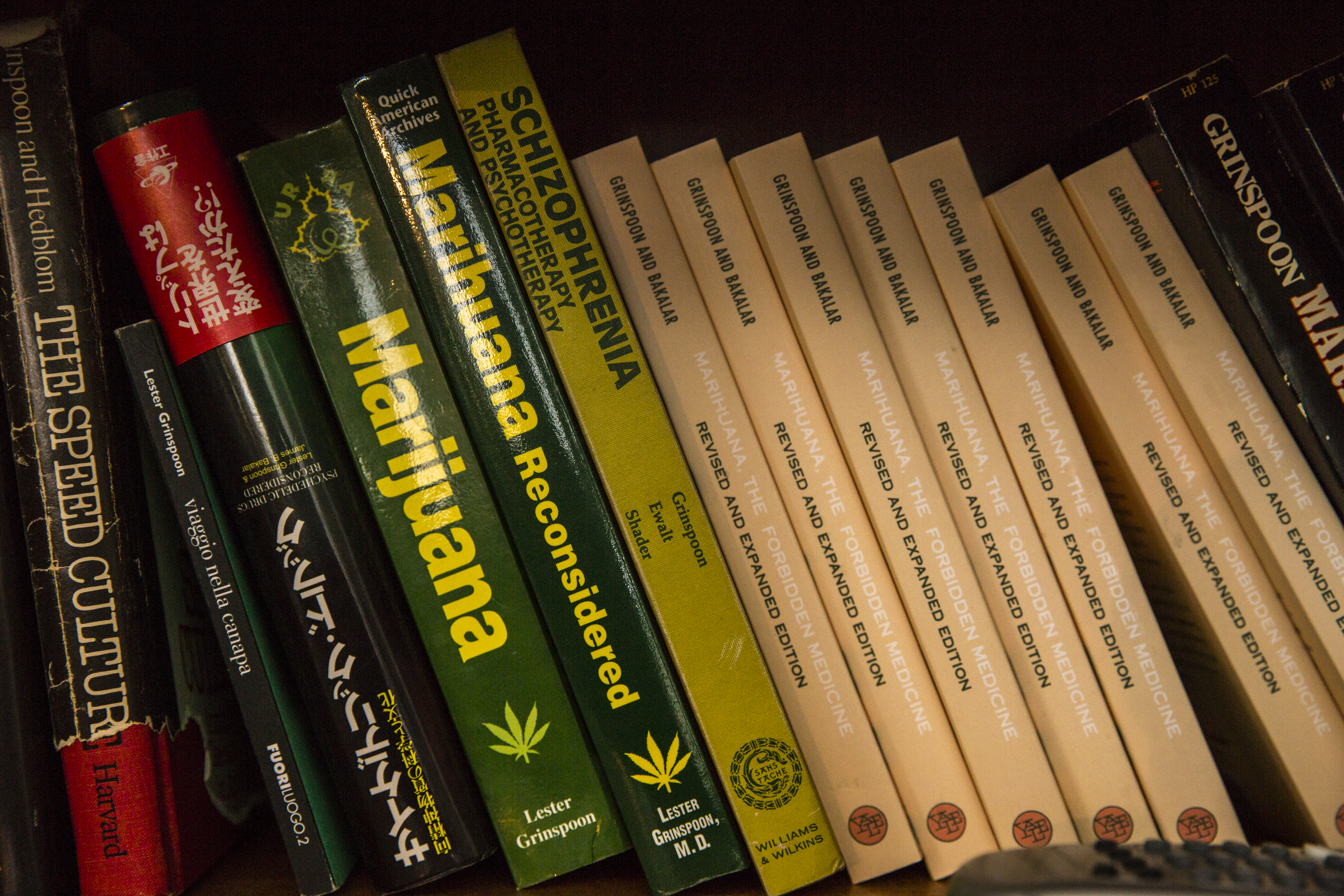 Copies of Dr. Lester Grinspoon's book "Marijuana Reconsidered" sit on a shelf in his home in Auburndale, MA.