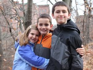 Jane, Martin, and Henry in 2012. The Richards were a family in constant motion, a whirlwind of pickups and drop-offs, sleepovers and birthday parties, homework, community projects, coaching, and church.