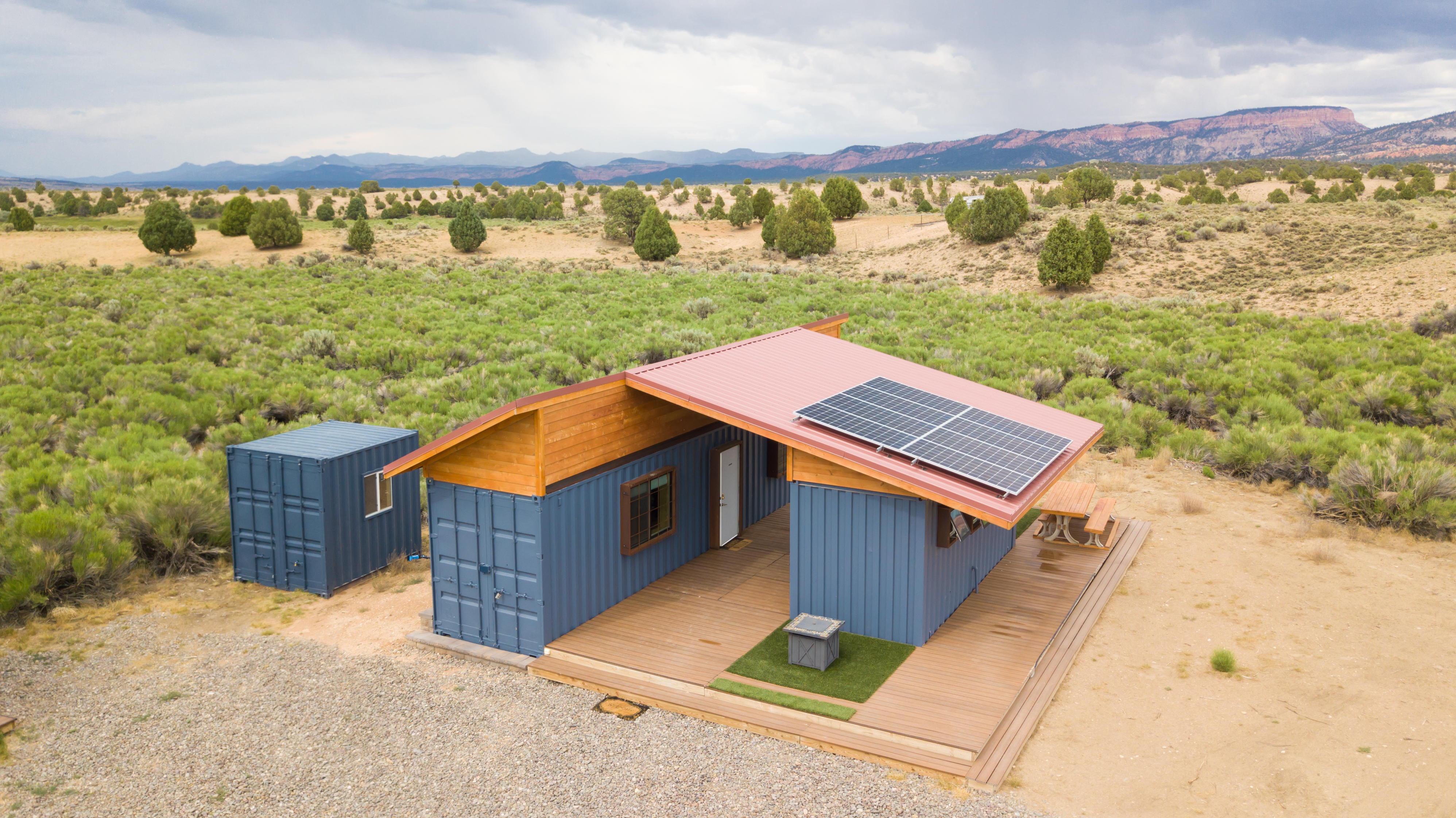 Sleep in huts with showers, lighting, solar power for charging devices, fire pits, and a fully stocked kitchen.