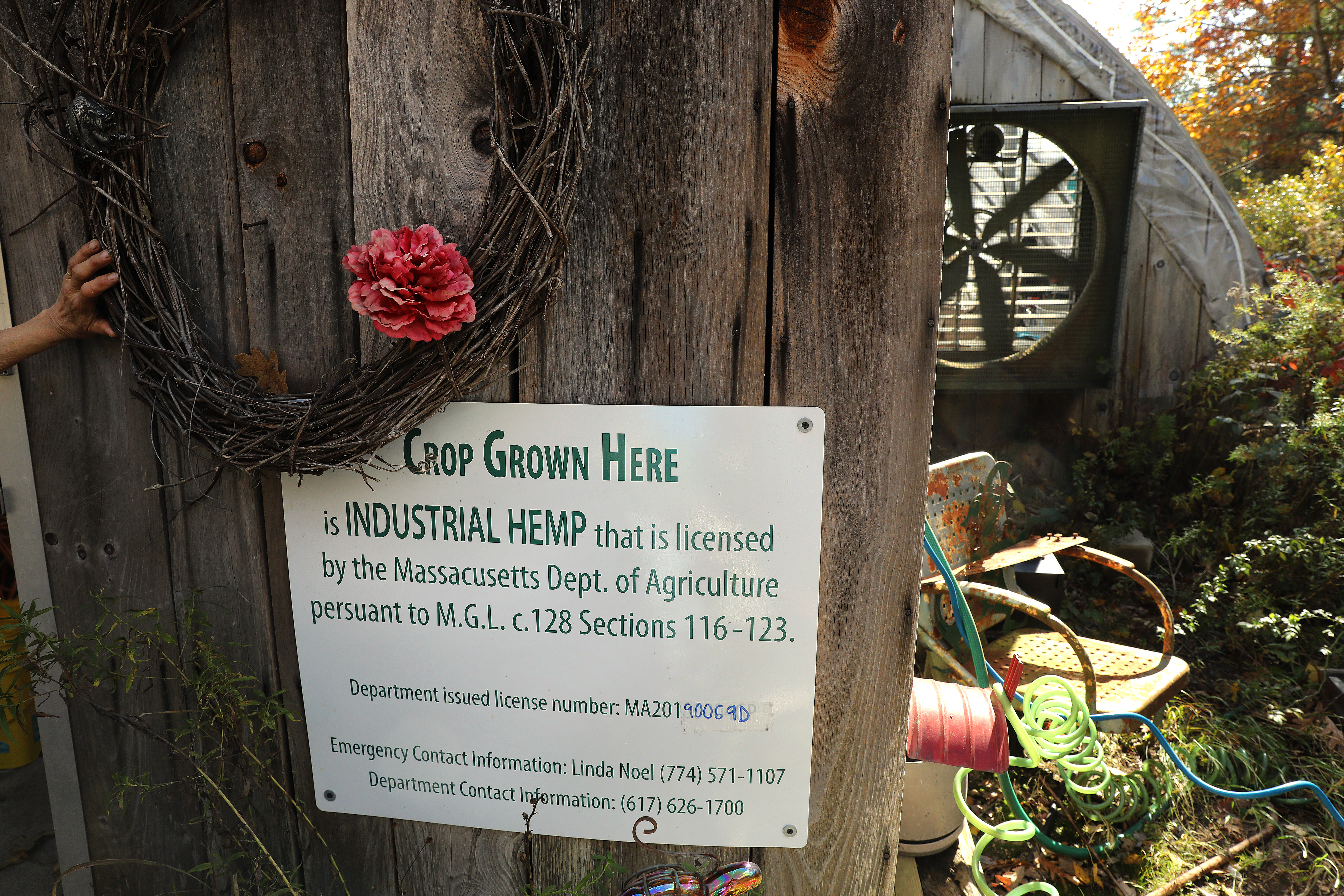 A sign posted on the outside of Terrapin Farm's main greenhouse cautions police and other visitors that the plant being grown there is legal — and not marijuana.