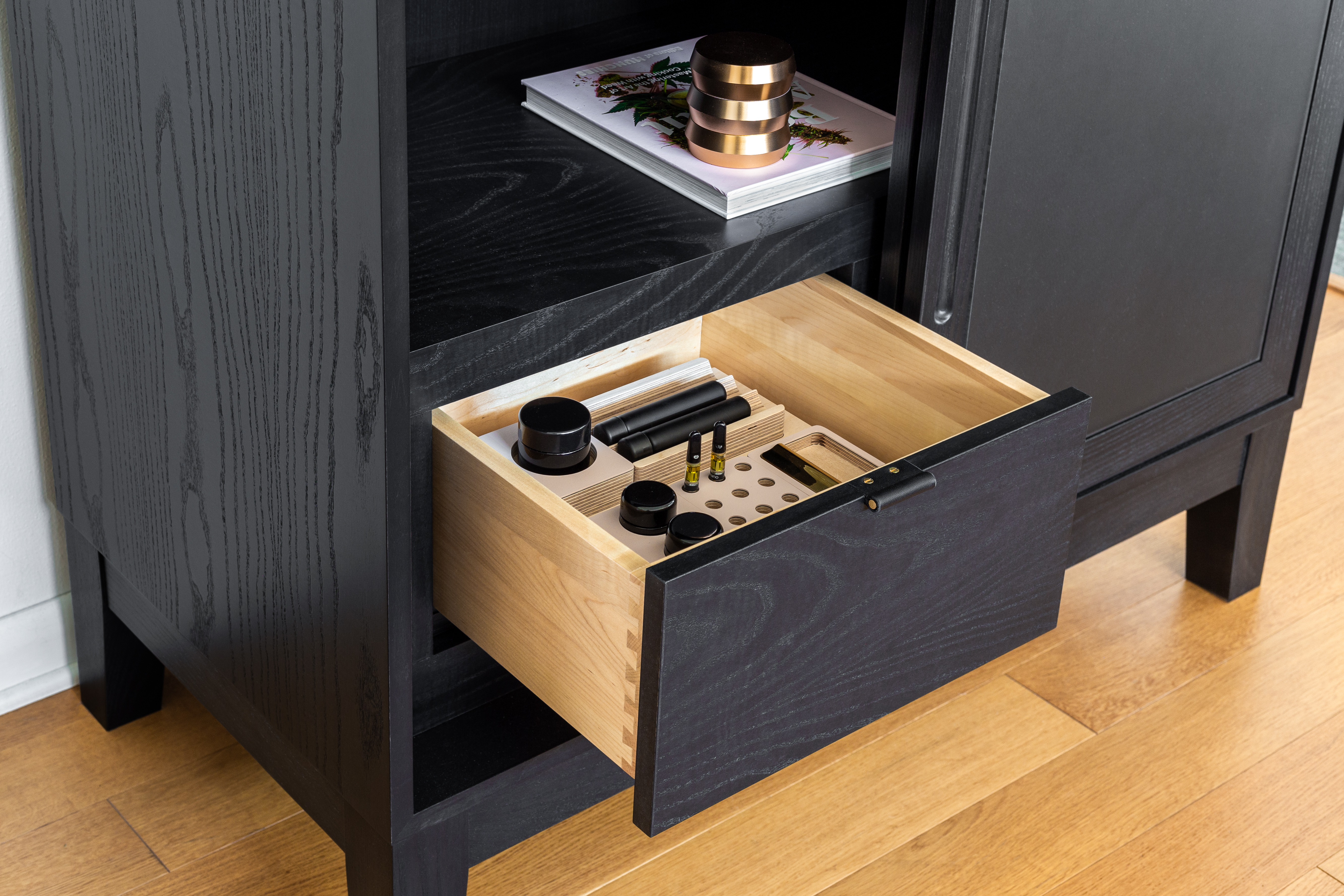 Organizational fixtures keep drawer contents tidy and accessible.