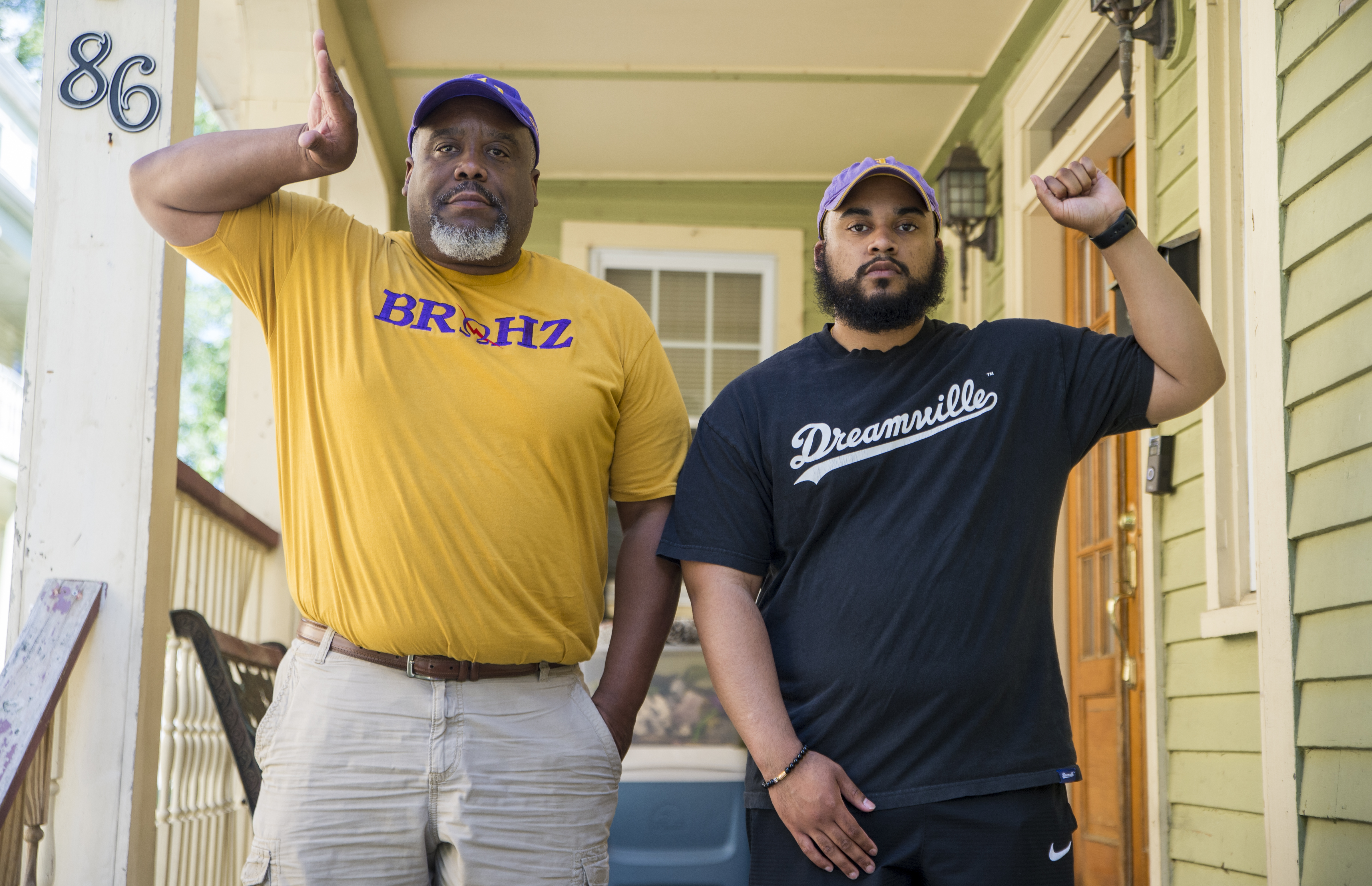 Ronald Riggs and his son, Avery Riggs, pose for a portrait in front of their home on June 18, 2020. The pair has gone to the Franklin Park Juneteenth celebration for more than a decade.