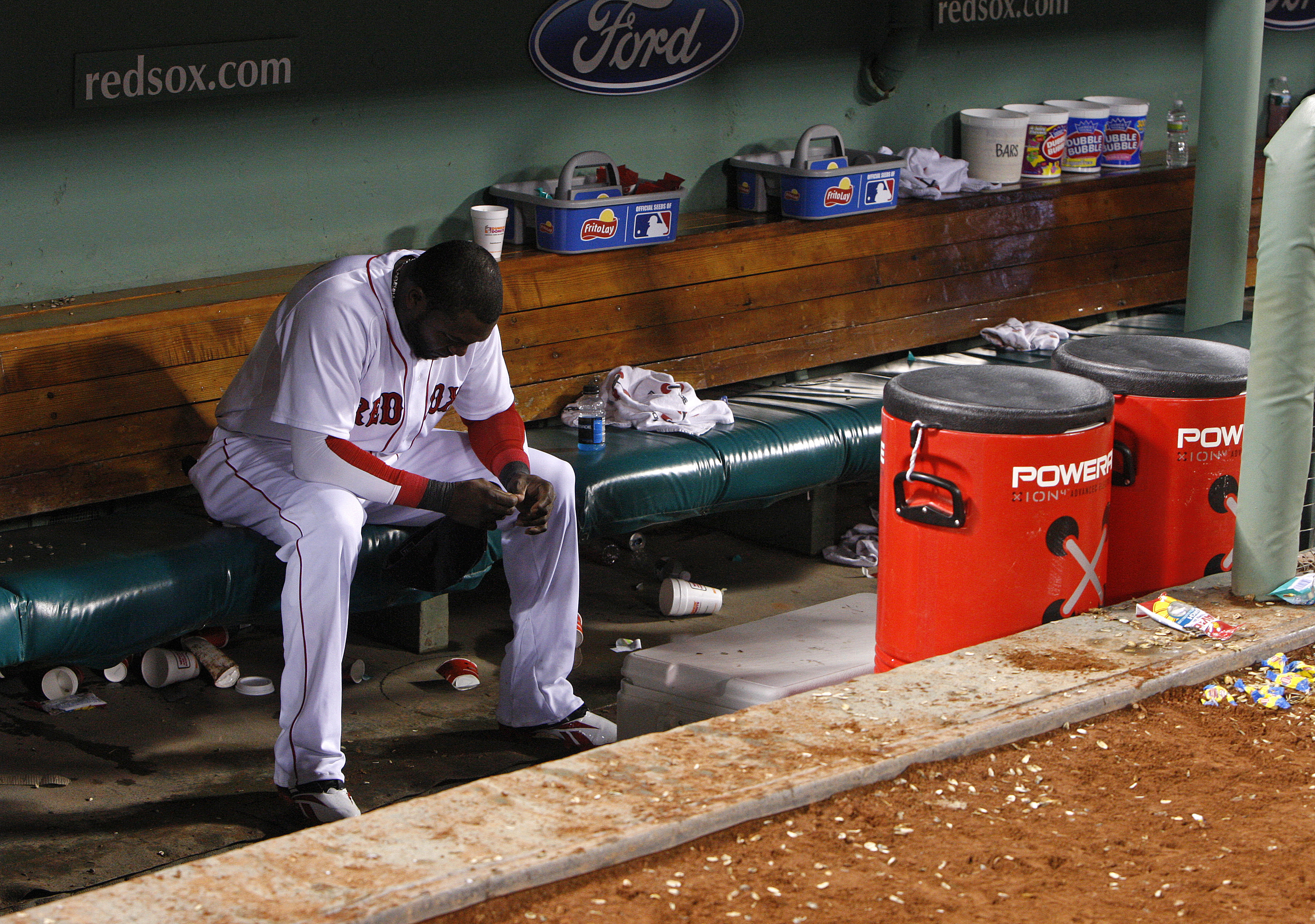 The Red Sox collapsed in September 2011, having entered the month with a nine-game lead and ending it out of the playoffs. Ortiz was dejected in the dugout after a Sept. 21, 2011, a 6-4 loss to the Orioles.