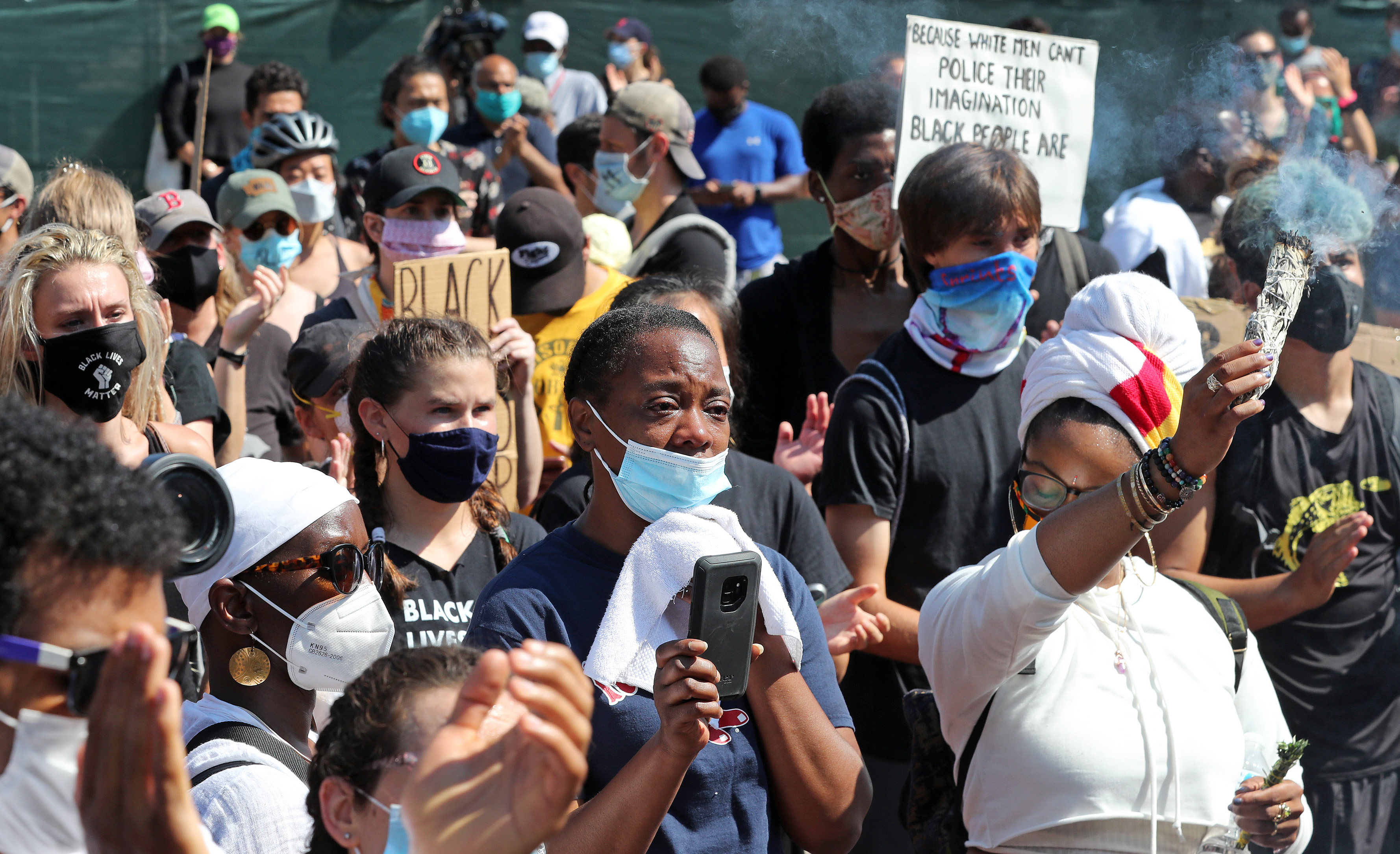 Protesters listened to the speakers at the State House.
